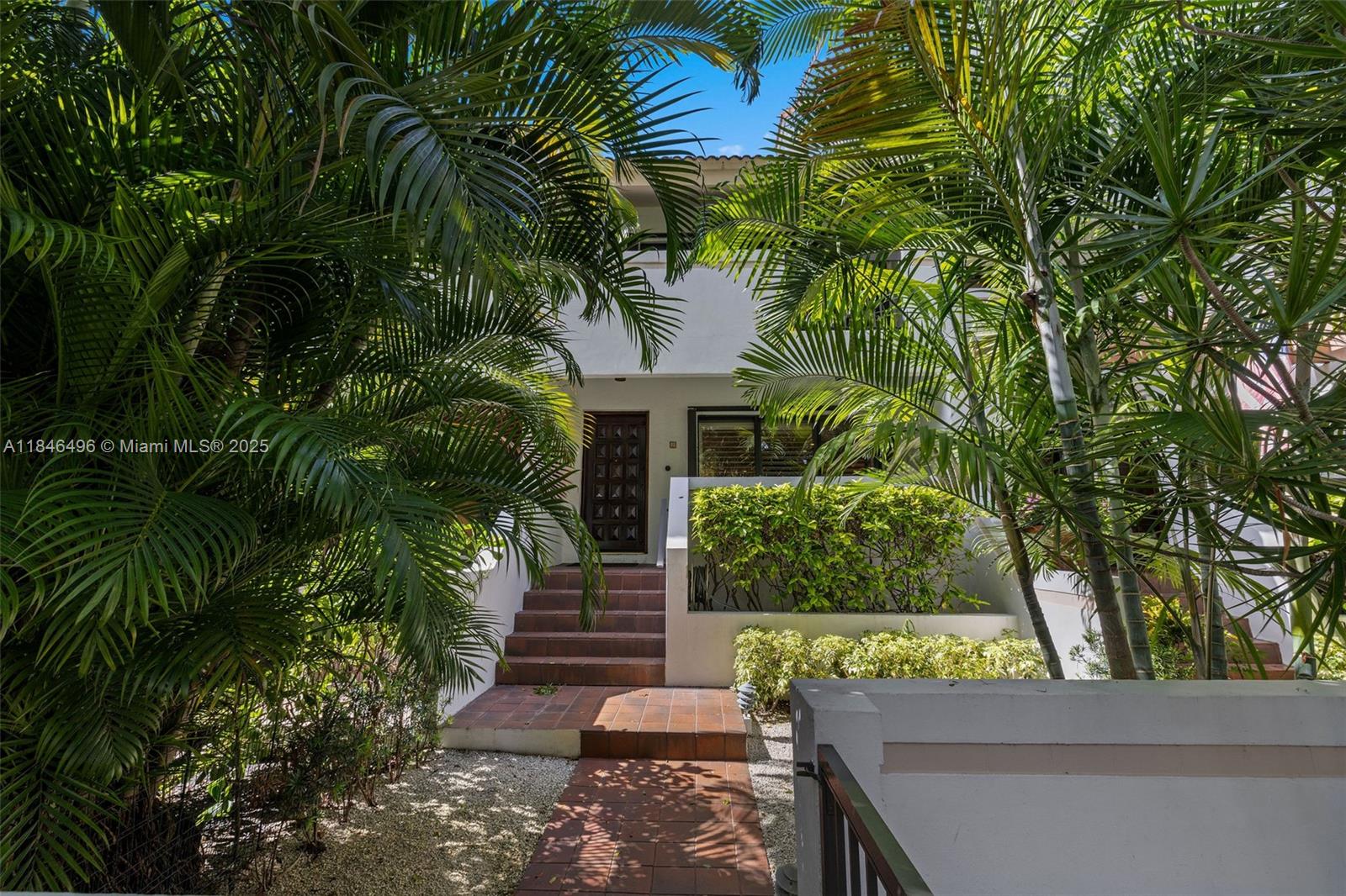 The ideal lifestyle in the heart of Coral Gables!  ENTRANCE ON THE BEAUTIFUL ALMERIA AVENUE, this tastefully redesigned townhome at Biltmore Court Villas faces the quiet tree-lined street. Open-concept living w/ a chef’s gourmet kitchen features custom cabinetry, sleek marble countertops, high-end appliances and storage galore. The white cabinetry theme is continued in both en-suite bathrooms and the downstairs half bath. Elegant finishes throughout: French oak hardwood flooring, plush carpet in bedrooms, a rebuilt staircase, new HVAC and electrical panel from the 2018 renovation. Convenient amenities: Elevator, 2 dedicated parking spaces, generous 40 ft storage unit, access to pool & BBQ in common area. Prime location: Minutes to Miracle Mile, UM, dining, shops, parks, trolly, and metro.