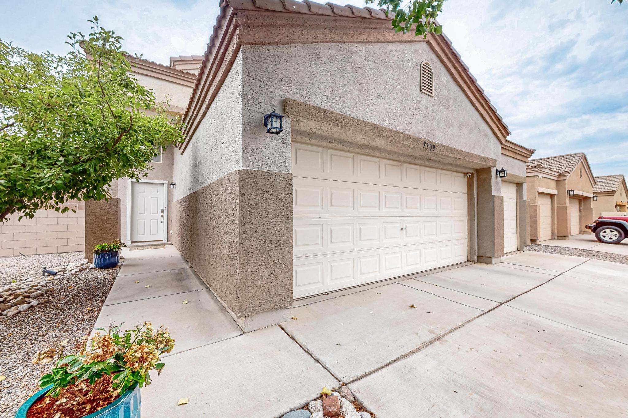 Welcome to this must-see 4-bed, 3-bath home on a spacious end lot with a highly desirable 3-car garage. The open-concept lower level is ideal for entertaining and includes an open kitchen overlooking the living room, a downstairs bedroom plus flexible space for a formal dining room, office, or playroom. Upstairs offers three additional bedrooms, including a large primary suite with a private balcony and a spacious bath featuring a garden tub. Thoughtful upgrades since 2021 include fresh paint, modern ceiling fans and light fixtures, a new dishwasher (1 year old), extended kitchen cabinets, and updated hardware. Enjoy outdoor living in the large, landscaped backyard -- perfect for hosting guests, playing with the kids, or letting pets roam free. Don't miss this incredible opportunity!
