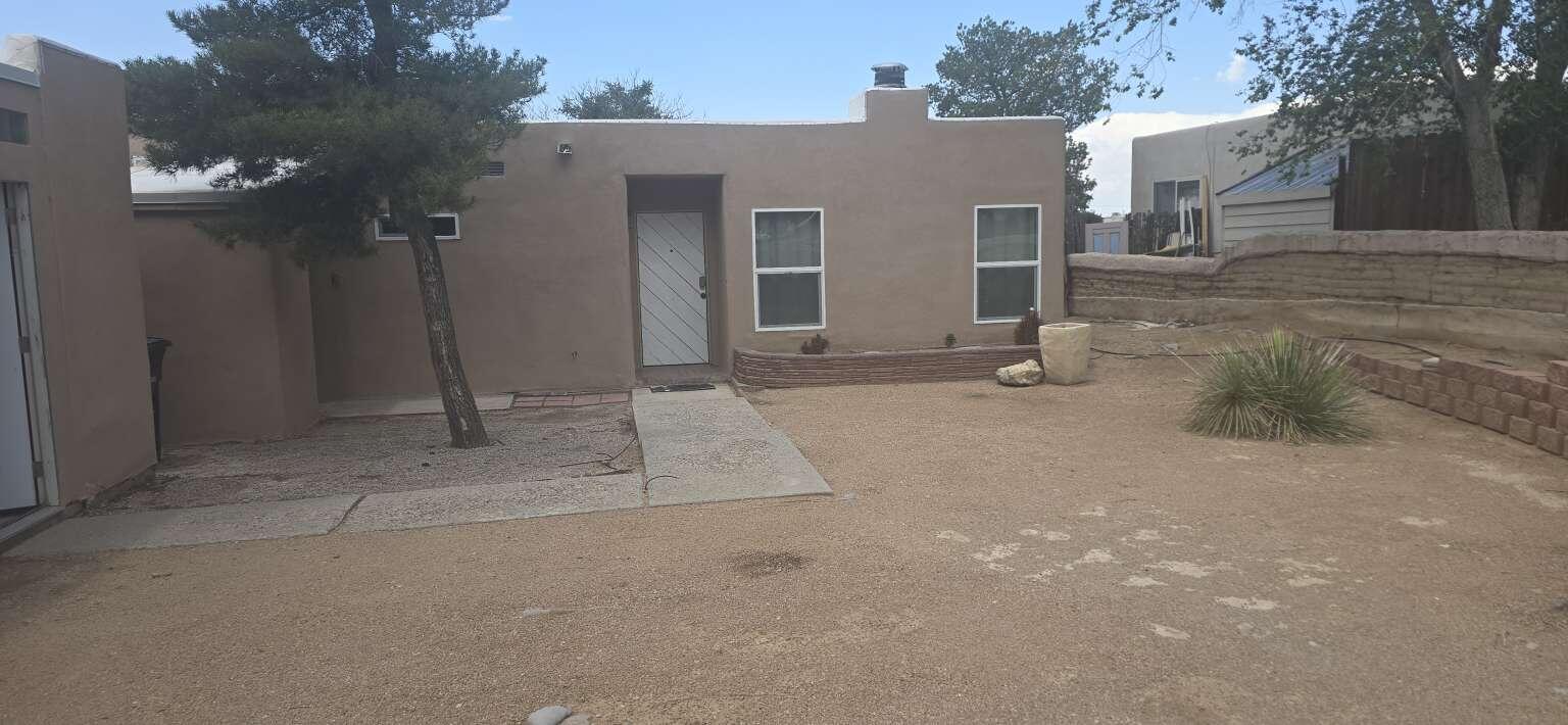 This charming and spacious 2-bedroom, 2-bathroom home is located on the east side of Tramway near the cross streets of Tramway & Encantado. It borders Open Space, offering beautiful views and convenient access to the mountains, while also providing easy city access via the freeway. Nearby amenities include Shopping and Uptown Shopping Center.Ideal Location: Walking/running/biking distance to foothills Minutes from UNM, Kirtland AFB, and Sandia LabsHome Features: Layout: Open floor plan, remodeled, and well maintained Style: 1-story with a slight 2'' step into the living area Character: Full of charm and SW architectural appealNew Stucco, TPO Roof, Central Air, updates throughout!