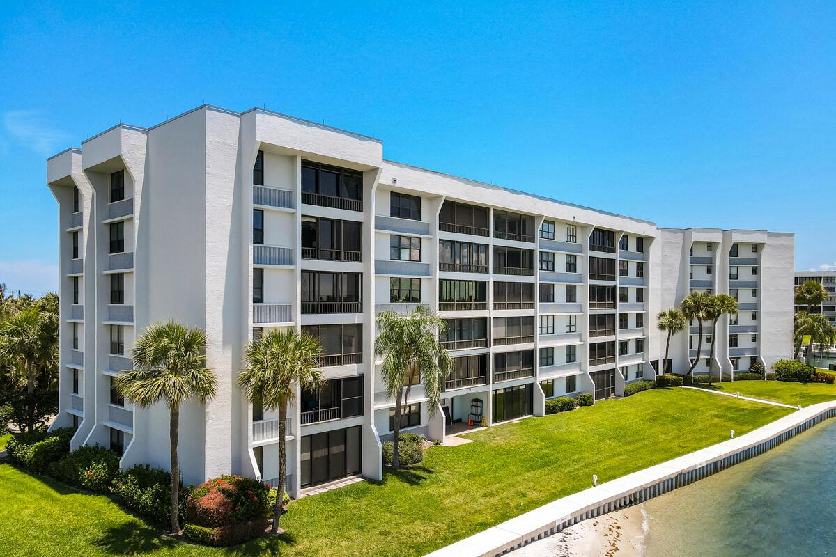 Amazing unobstructed views of blue water tides, ocean and river, sunrise and sunsets. Watch the dolphins and turtles and manatees swim by! ***STAY TUNE FOR NEW PHOTOS & FLOOR PLAN***THE BEST waterfront building in THE BEST waterfront community in Jupiter Building. Split Bedroom plan.  Private marina with up to 40' dock spot available for rent or purchase, when available. Gated Entry; Carport Parking with 3' x 8' (+/-)  Storage unit...plus extra storage on 5th floor storage unit. Private Tiki, Tennis, CLUB House & Community Pool.