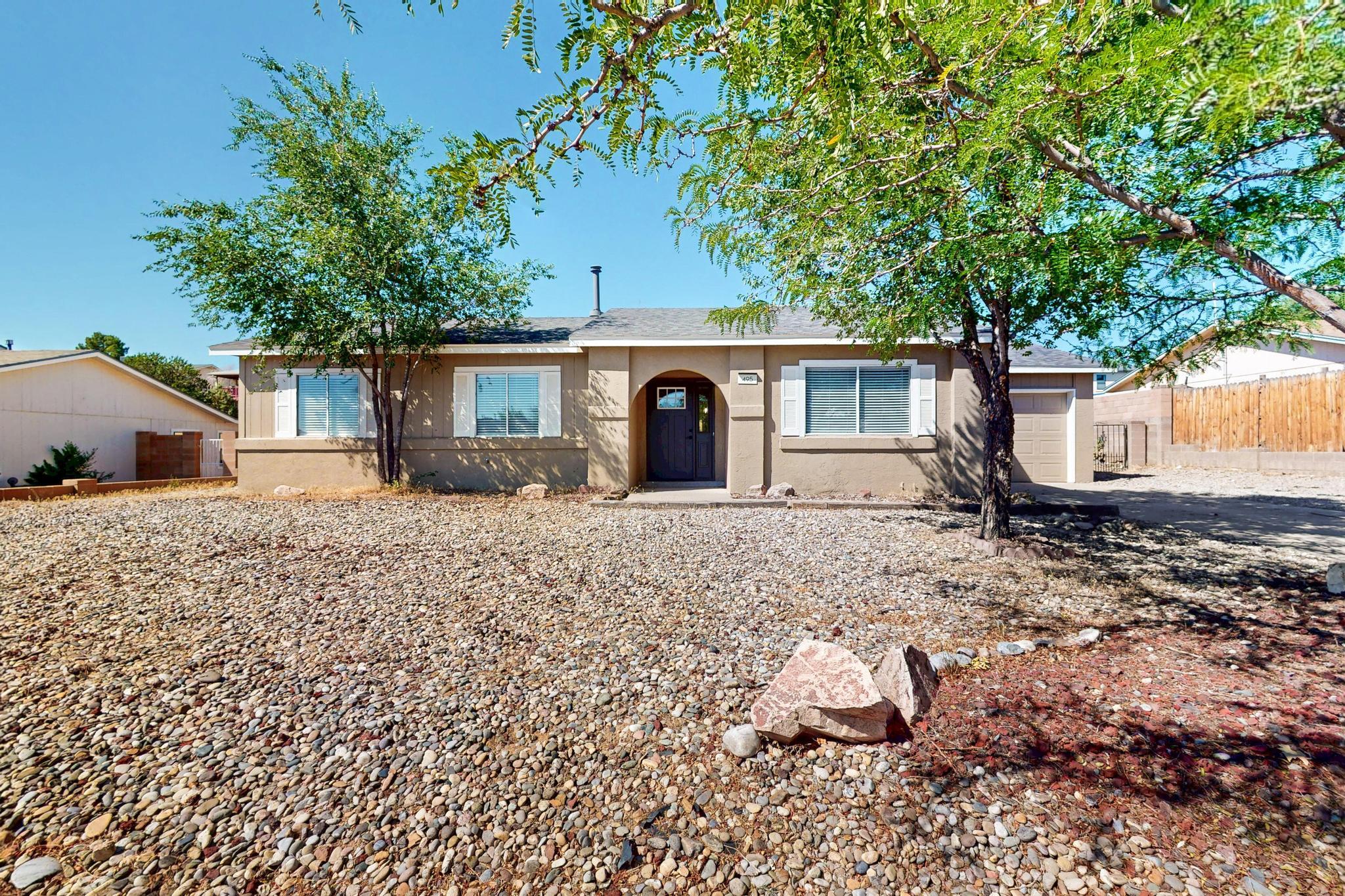 Welcome to 495 Rockaway Blvd! A charming and move-in-ready 3 bed, 2 bath home nestled in the heart of Rio Rancho.  This beautifully updated property combines modern comfort with everyday convenience. Step inside to discover stylish updates throughout, including updated flooring, and a bright open layout, perfect for both relaxing and entertaining. Out back, you'll find a generous backyard with ample space for any family. This blank slate is ready for your dream garden, outdoor kitchen, or play space. This updated gem is in a great location, offers exceptional value and potential! Don't miss out, schedule your showing today!