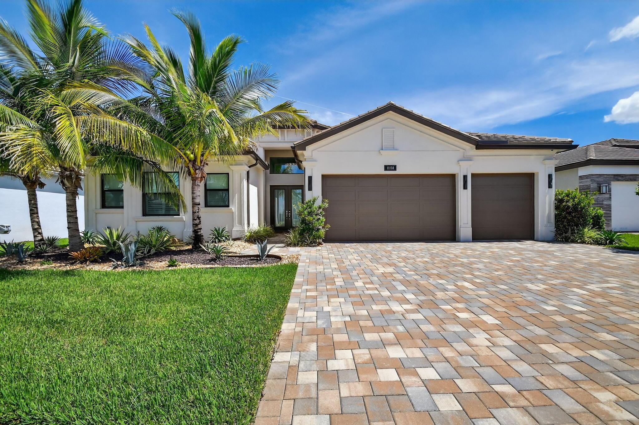 A MUST SEE!  Hardly Lived-In this AMAZING 4 Bedroom/4 Bath Custom-Designed Charleston Grande Crown Showcase is a 3,277 sqft WOW HOME in the most desirable Active Adult Valencia Grand GLHomes community! Bring your bathing suit, toothbrush and racquet now with no wait to be built! Enjoy a private resort landscaped backyard with a magnificent large heated saline pool featuring an oversized 6-jet spa that invites endless great times with no houses in view! Relax on the in-pool sunshelf overlooking deck-to-pool fountains, a bubbler, expanded spillover, with a beautiful nighttime light show of 6 synced color-changing lights... a 5-step easy entry, custom painted artisan handrail, an in-pool walking path, a swim lane, an extended patio From oversized white marble-like porcelain 36"x36" tiles, to crown moulding, to new mini-bar, genuine marble electric fireplace focal wall unit, and exceptional lighting fixtures throughout. White Glossy Flat Panel cabinets, waterfall kitchen Island, Spectacular Natural Mother-of-Pearl Silver Minibrick backsplash. Designed for Easy Entertaining at Kitchen bar or in Formal Dining Room, Eat-In Kitchen, or Outdoor Patio. Equipped with 5-zone Sonos System throught home inc. Surround Sound Media in Family Room. Upgraded Countertops in Bathrooms and Framed Mirrors throughout. Expanded 3-car garage with straight-on entry and EV charger. House vibrates incredible aura DAY AND NIGHT with natural light, magnificent chandeliers, sconces and outdoor lighting.  Welcome to Your Dream Home with a Country Club Lifestyle without the Country Club fees. 

Valencia Grand, a guard-gated community, boasts a 44,000 sqft clubhouse, INDOOR PICKLEBALL, Tennis Courts with full programs, endless activities, Shows, Card Rooms, Clubs, Grand Ballroom, Cafe with indoor/outdoor seating, Full Exercise Studio and Fitness Center, Bocci, Salon for haircare, facials and massages. This Crown section is conveniently located across the street from the Clubhouse and mailboxes.