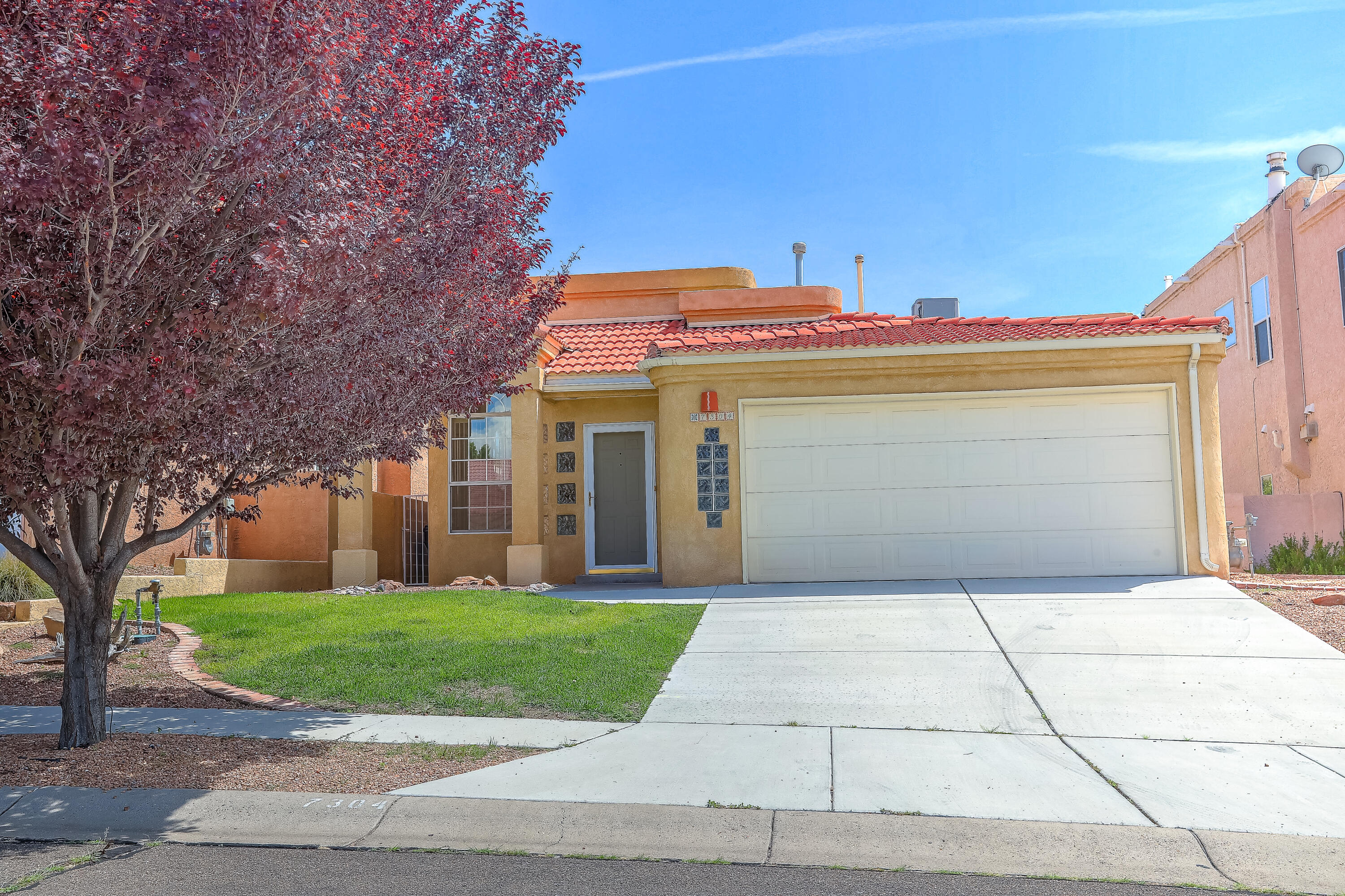 Beautiful home in Palomas Park.  Curb appeal includes Spanish tile roof, stucco, grass with brick border, and exquisite window package.  Once inside you will notice soaring ceilings, open kitchen, an office, lots of natural light due to distinct windows and skylights, two fireplaces, and large living room.  The kitchen features a large island with seating for 5-6, SS appliances that stay, breakfast nook, and 2-sided fireplace.   The primary bedroom is abundantly sized, as is the primary suite and XL walk in closet.  Large roman soaking tub with separate shower.  The backyard is landscaped and low maintenance.  Enjoy this beautiful neighborhood close to shopping, parks, and walking trails.