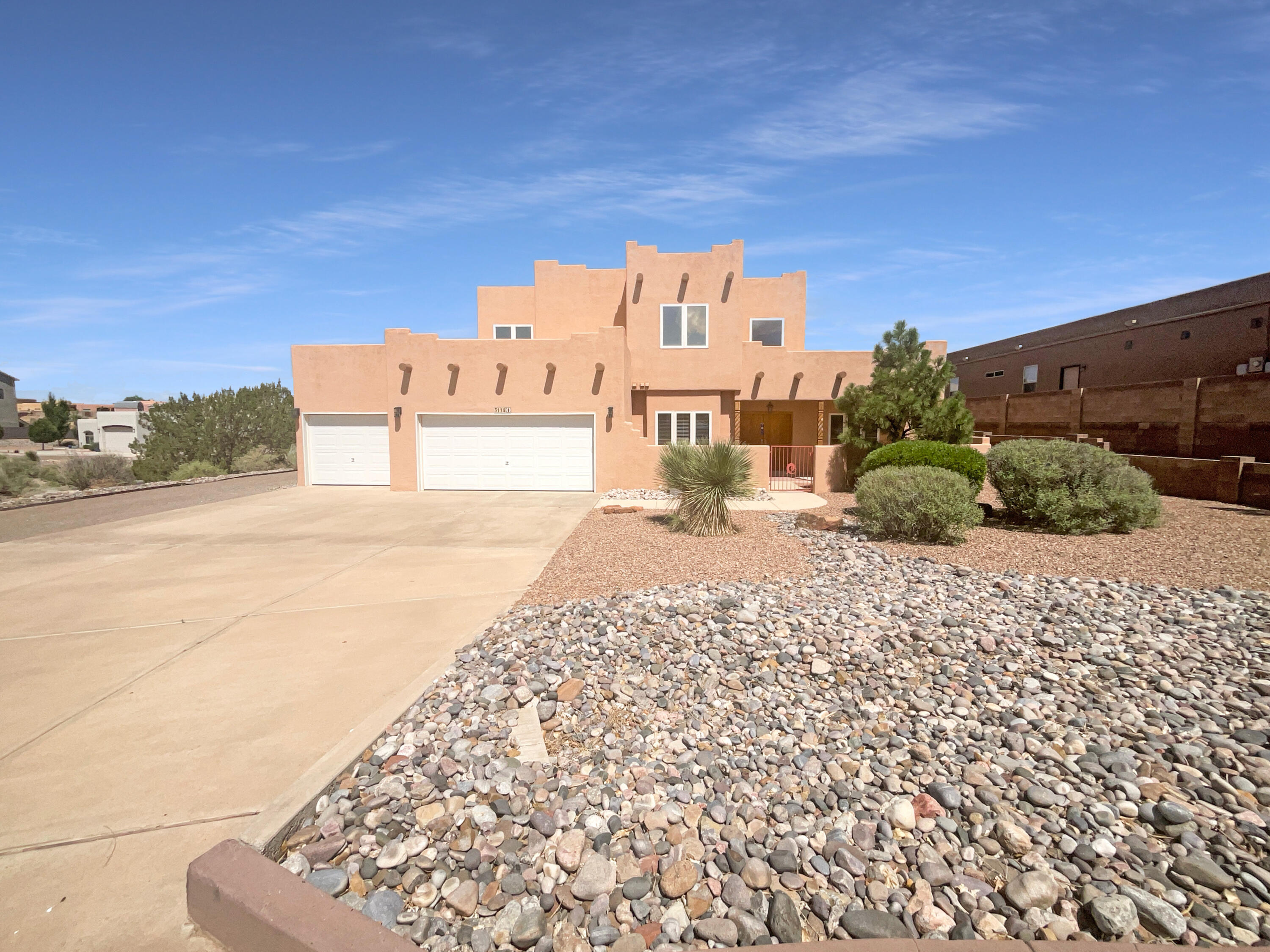 Stunning 5 bedroom home in the desirable Vista Entrada area!  Three car garage, RV gate on a cul-de-sac on a large lot! Beautiful front courtyard. Downstairs features a bedroom with a full bath.  A fireplace and a soft neutral color palette create a solid blank canvas for the living area. Relax in your primary suite with a walk in closet included with a private balcony retreat  with stunning views. The primary bathroom is fully equipped with a separate tub and shower, double sinks. Take it easy in the fenced in back yard. The covered sitting area makes it great for BBQs! Like what you hear? Come see it for yourself! 100-Day Home Warranty coverage available at closing