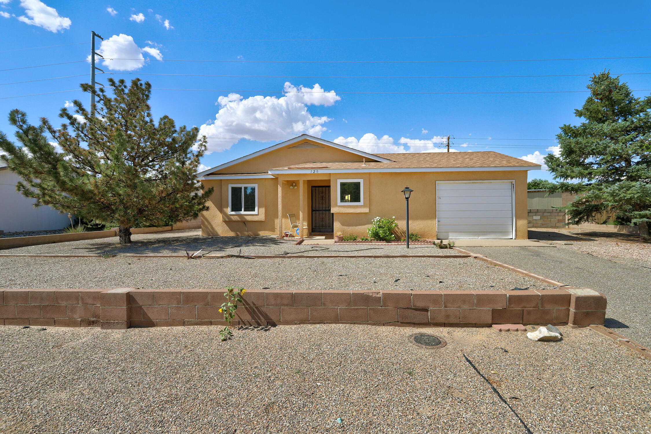 This inviting two-bedroom, one-bath home offers cozy living with thoughtful updates and a beautifully landscaped backyard. Inside, you'll find a warm and functional layout with natural light and comfortable living spaces. Step outside to a spacious, fully landscaped backyard--perfect for outdoor dining, gardening, or relaxing under the New Mexico sun. Whether you're hosting friends or enjoying a quiet evening, this yard is your private retreat. Ideal for first-time buyers, downsizers, or anyone who appreciates outdoor space and a homey feel.