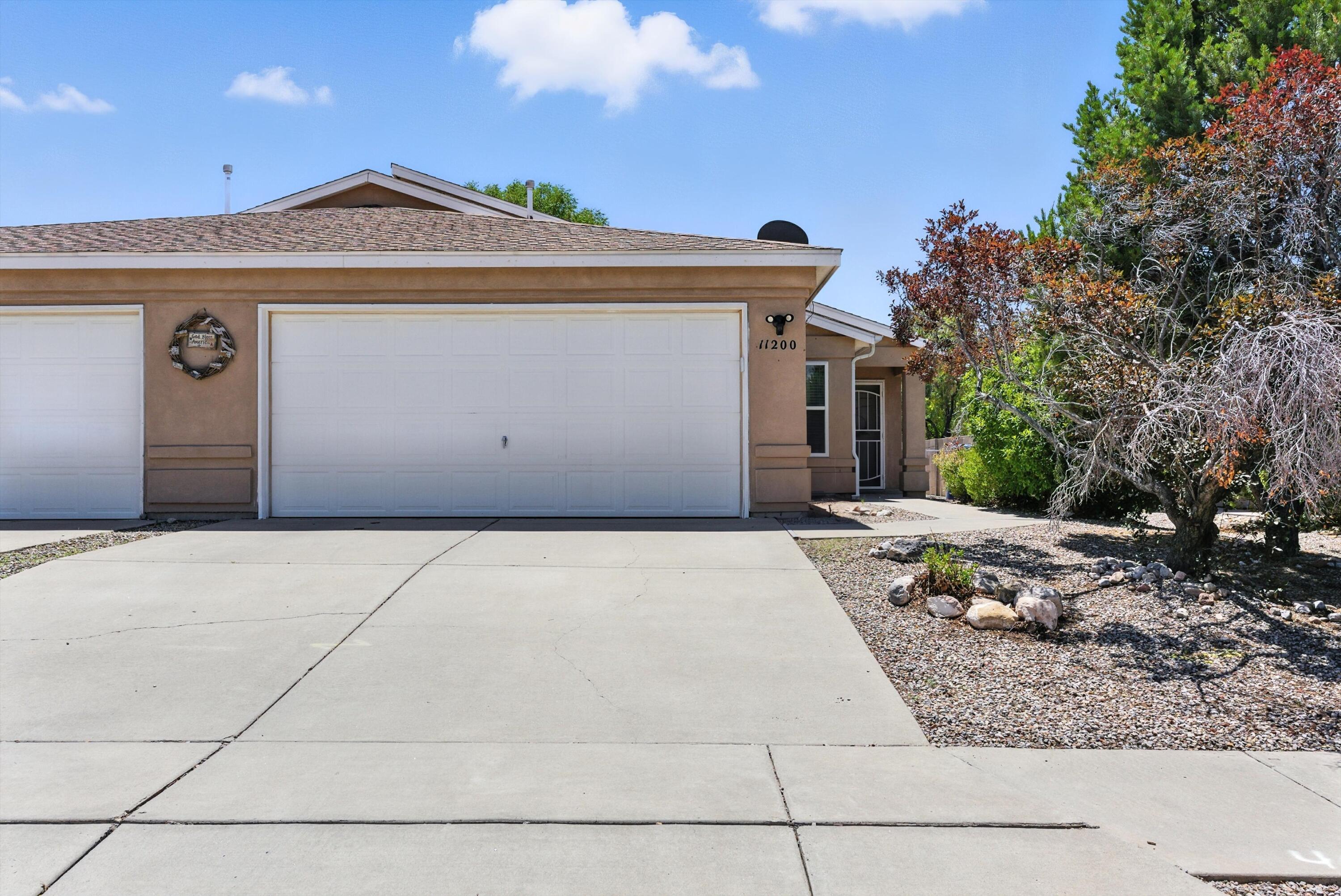 Welcome to the pristine community of Miravista! Step inside this well-maintained townhome and discover a bright, open layout with 3 bedrooms, 2 baths, and a 2-car garage. The efficient kitchen flows into the dining and living space, making everyday life feel effortless. Enjoy the ease of a low-maintenance yard and a private, walled-in patio--perfect for unwinding after work or hosting friends. With quick access to I-40 and just minutes from Kirtland Air Force Base, you're never far from where you need to be. Great first home or an investment! New AC in 2021, New Garage Springs in 2023! New Garage Door Opener 2024! Schedule your showing today!
