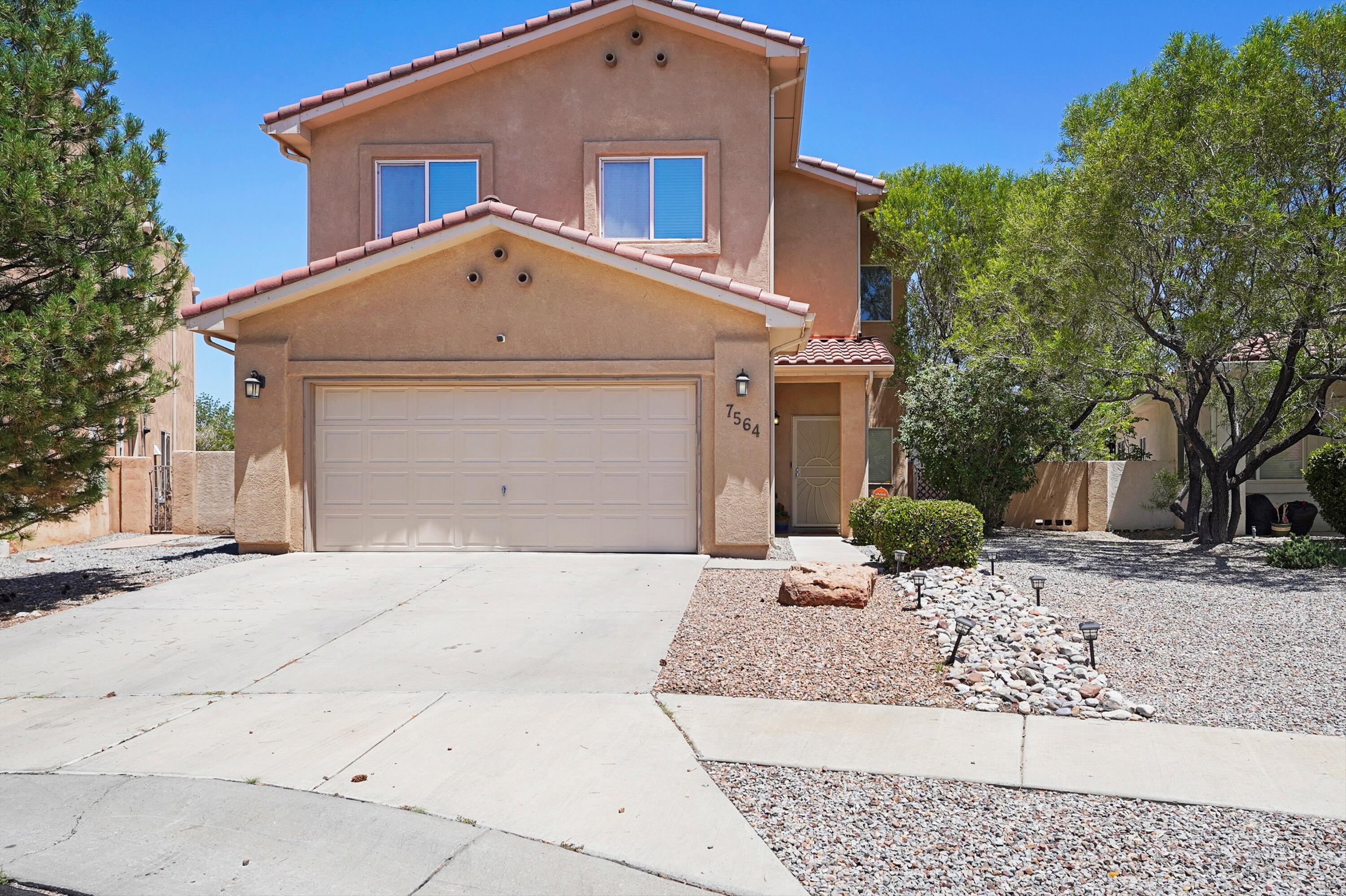 Experience this updated 4-bedroom, 2.5-bath home in Albuquerque's sought-after Vista del Norte community. Bright interiors feature soaring ceilings, modernized bathrooms, and a stylish kitchen with granite countertops and stainless appliances. The open-concept living and dining areas flow seamlessly, perfect for entertaining. Upstairs, a serene primary suite offers an updated bath and generous closet space. Enjoy a private backyard with covered patio, turf, trees, and a storage shed. Two-car garage, central refrigerated air, and low-maintenance landscaping complete the home. Conveniently located near Vista del Norte Park with trails, schools, shopping, dining, and quick access to I-25. A perfect blend of comfort, style, and location.