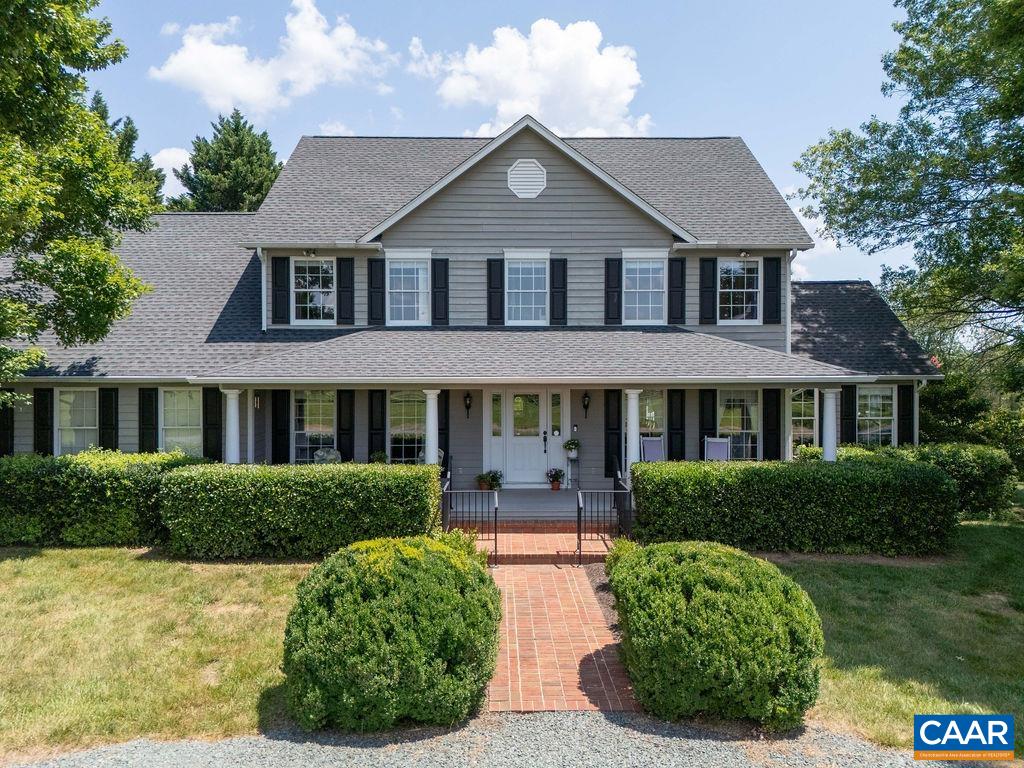 Looking for bold, unobstructed Blue Ridge Mountain views? Welcome to 2325 Browns Gap Tpke! Just minutes from Western schools and shopping, and perfectly sited on 4+ level acres, this masterfully built & meticulously maintained farmhouse is on the market for the first time. Delightful sunroom, deep covered porches, screened porch, & expansive deck offer endless spots to relax & take in the privacy, nature, & sweeping “big sky” views that define this part of Albemarle County. Designed for comfort & beauty, this classic home features vaulted ceilings, skylights, a stone wood-burning fireplace, hardwood floors, & an open-concept kitchen/family room. The tastefully renovated kitchen includes white shaker cabinetry, granite, subway tile backsplash, & stainless appliances. All 3 full baths have been updated w/ modern tile, granite, & fixtures. The walkout lower level offers flex space w/ sunny family room, full bath, workshop, & single-bay garage. Even the detached garage—w/ cupola & weathervane—blends charm & function, providing space for extra vehicles or equipment. A rare opportunity to enjoy timeless style & panoramic views in one of Charlottesville's most picturesque settings! Open House Sunday 8/3 from 1:00-3:00.