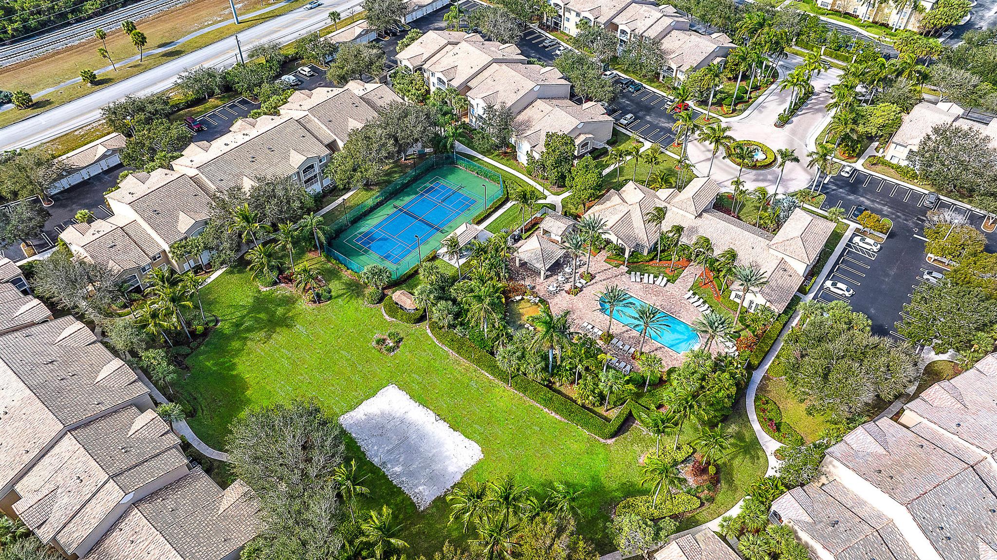 PRICED TO SELL!! Pix coming soon! Lighthouse Cove is a beautiful condo community close to the beach & has lush resort-style grounds in Tequesta. This 2 BR 2 BA condo features open concept living w/ high vaulted ceiling, new luxury vinyl tile in both bedrooms & closets, large kitchen w/ brand new stainless steel appliances, white cabinetry, granite countertops, breakfast bar & beautiful green space/tropical views. Enjoy split BR floor plan & large screened porch w/ access from bedrooms & living area. Both bedrooms are spacious, walk-in closet in master & 2 large closets in guest bedroom. Walk to restaurants, shops & Publix. Unit has 2023 water heater & new closet doors. What makes this community so special are the amenities: tennis/pickleball courts, gym, Resort pool (See Supplement)