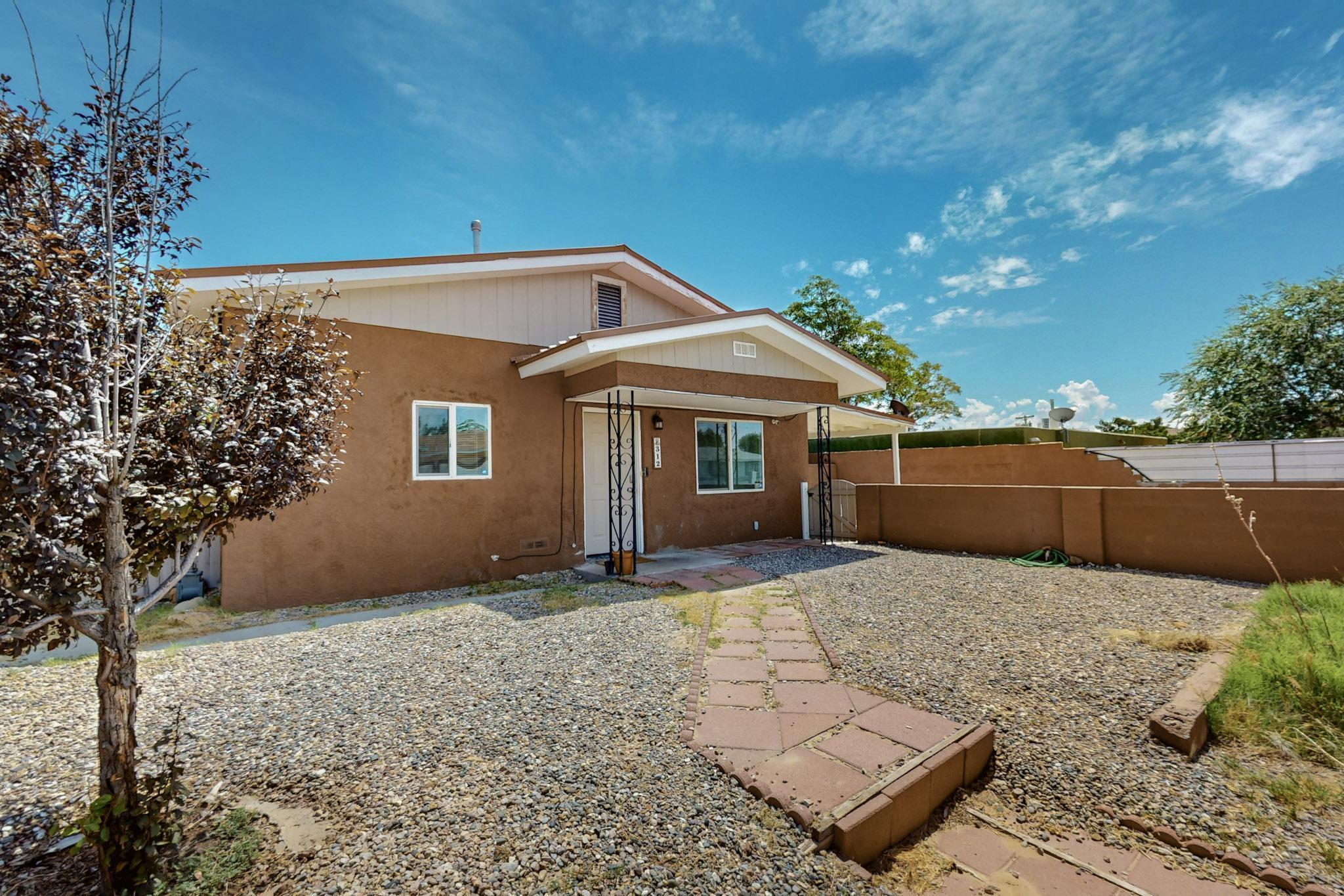 Beautiful, clean 3 Bedroom, 2 Bath NW home ready for a new owner.  It has tile flooring in kitchen, dining room and bathrooms, carpet in all 3 rooms.  Synthetic stucco is still in great shape, metal roof and has a good size back yard.  It's centrally located near Route 66, restaurants, shopping and just minutes away from freeway.  Washer & Dryer DO NOT convey. Motivated Seller, will entertain all offers. You must come see to appreciate it.  Schedule your showing today.