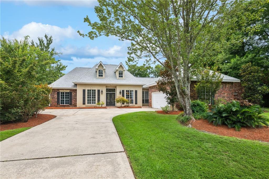 Welcome to 511 River Oaks Drive—a beautiful, inviting home that’s ready to accommodate your lifestyle! This spacious residence features 5 well-appointed bedrooms and 3 full bathrooms, along with 2 convenient half baths, offering plenty of room for family and guests.

As you enter, you'll be captivated by the large living room that boasts a spectacular view of the stunning in-ground pool, complete with a serene waterfall feature. The upstairs family/game room provides an ideal space for relaxation or entertainment and includes a handy half bath for added convenience.

Enjoy the benefits of a newer roof and an attached 2-car garage, making daily life easy and worry-free. The property also features a Rain Bird sprinkler system, an outdoor shower for those warm days, and no carpet, which makes maintenance a breeze. Fresh paint throughout the home gives it a modern and welcoming feel.

Situated in the highly sought-after Mandeville school district, this home is IDEAL for families looking for great educational opportunities. Your family can also enjoy community amenities such as a clubhouse, pool, tennis courts, and engaging scheduled events that foster a sense of community and belongingin your new subdivision RIVER OAKS ESTATES.

This home is ready for you to make it your own—don’t miss the chance to experience this wonderful property in a vibrant neighborhood. Schedule your viewing today!