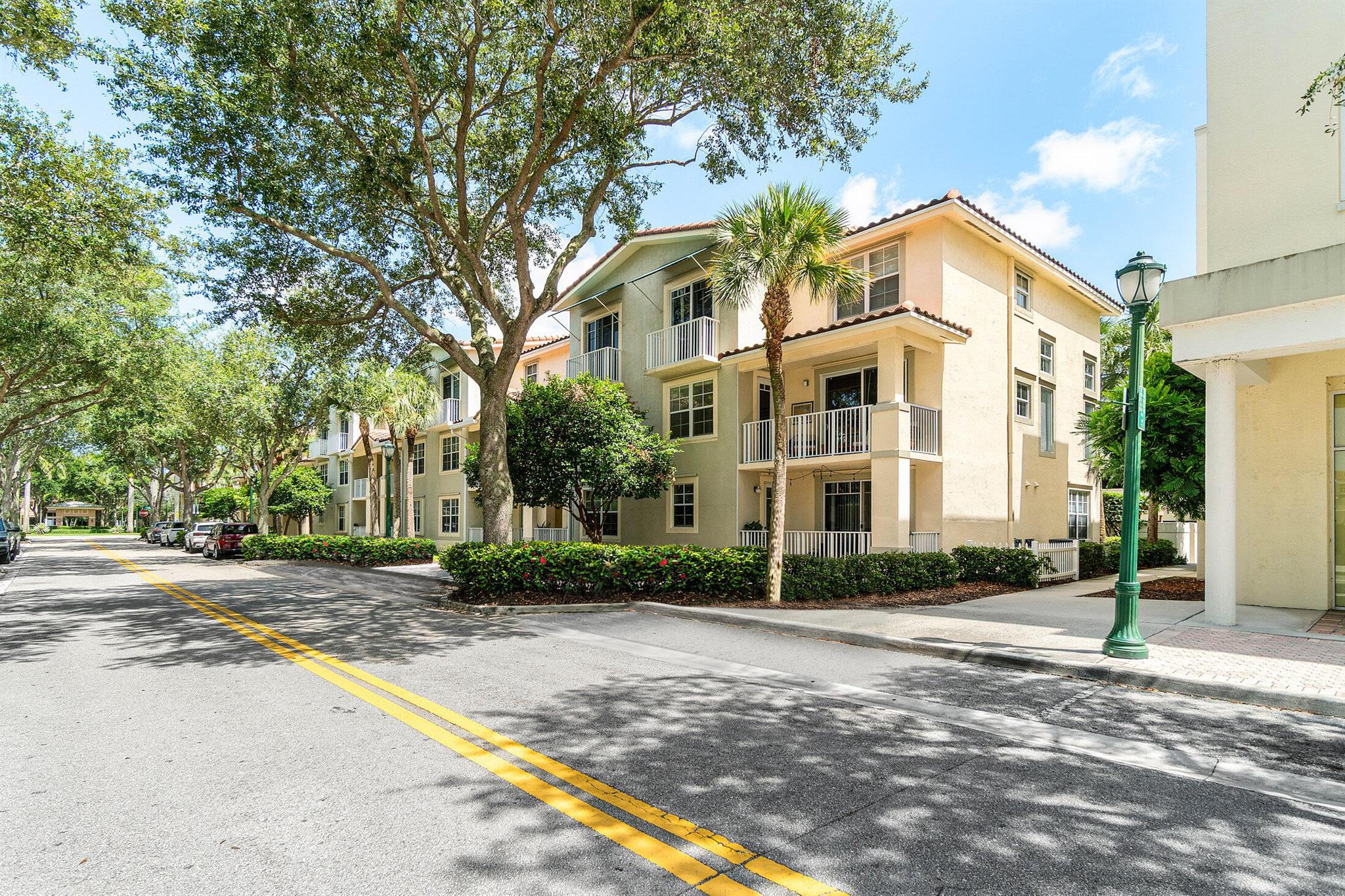 Charming 3-Bedroom, 3-Bath END UNIT in the heart of Jupiter offering the ultimate in convenience & style. Stunning soaring ceilings & floor-to-ceiling windows flood the space w/ natural light. Multiple balconies offer a perfect spot to unwind. Open staircase & 20-ft ceilings in foyer and great room add to the luxury urban feel. The updated white shaker-style kitchen serves as the heart of the home w/ cafe & dining areas, in-unit laundry, pantry, granite counters & newer appliances.  Coastal style ''white oak'' vinyl plank flooring throughout gives a modern and sleek feel + easy care! Ideal floor plan w/ 1 bedroom, 1 full bath downstairs + 2 bedrooms, 2 bathrooms upstairs. Every bedroom has its own en-suite bathroom!  IMPACT WINDOWS & DOORS | AC 2018 | Water Heater 2016 | Roof 2021 Live where you play! On Main Street @Abacoa Town Center, you'll have direct access to a lively blend of shops, restaurants, and entertainment, including an amphitheater hosting live events, spring training baseball, Florida Atlantic University Honors College and a variety of outdoor activities. Enjoy nearby amenities including a public golf course, parks with pickleball courts, playgrounds, and a skate park - all just a short walk away.  10 mins to the beach, offering the perfect balance of coastal living and urban convenience.  Easy commute - 3 mins to I-95 and 10 mins to the Turnpike.  Also, an excellent housing opportunity for students looking to walk to campus.  Leasing allowed for a min. of 90 days/ up to 2 leases per year.  Pet friendly up to 2 pets, no weight limit (breed restrictions apply).  Plenty of parking for overflow in an adjacent parking garage.  Condo fees include: Internet, cable, building insurance, trash, exterior maintenance + amenities including pool, spa, clubhouse &amp; fitness center!