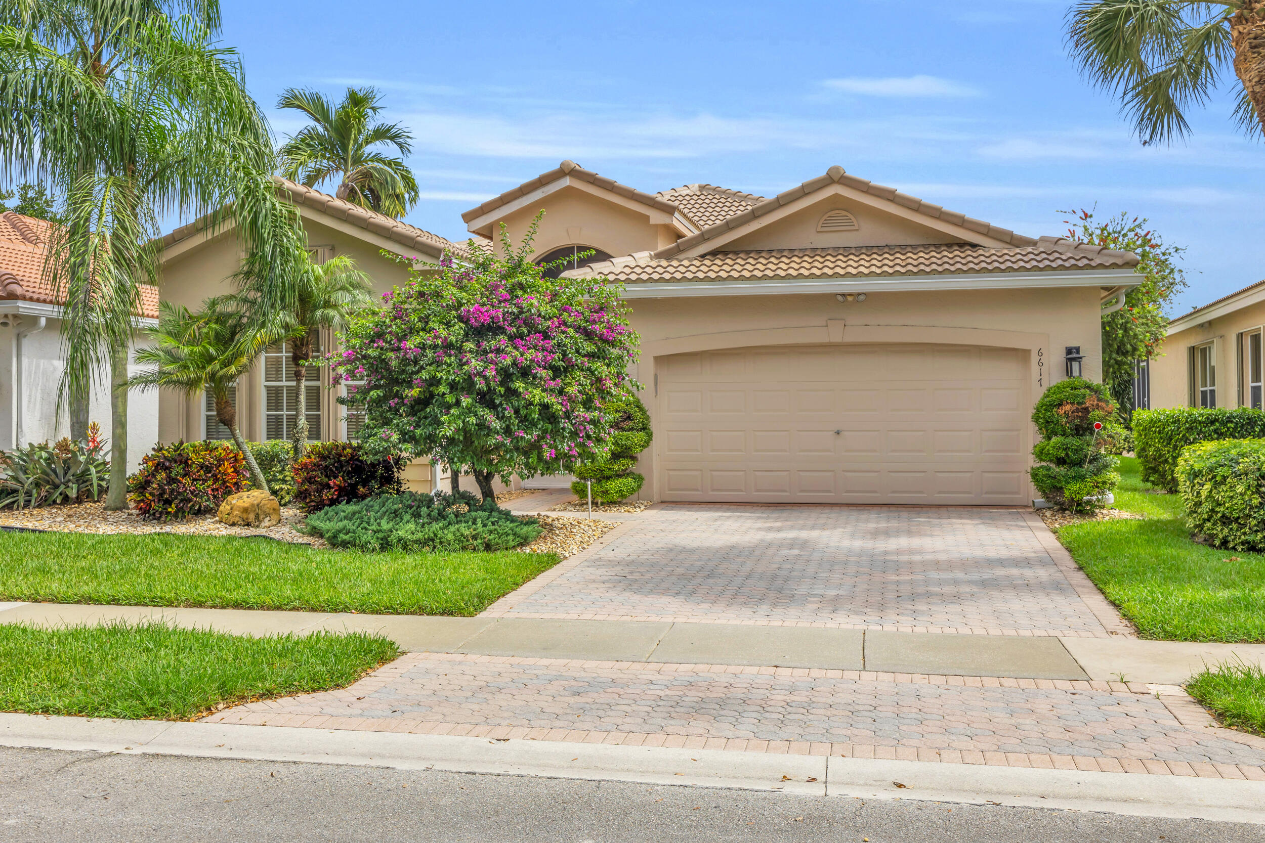 Resort-style living meets waterfront luxury in this stunning 3BR/2BA pool home in Valencia Isles! Featuring custom-built-ins, a new roof (2025), and storm shutters, this residence blends style, comfort, and peace of mind. Enjoy water views from your private pool or host friends on the spacious screened patio. Custom-decorated and available furnished or unfurnished, it's ready for you to move right in. Valencia Isles offers a vibrant clubhouse with fitness, tennis, pickleball, bocce, billiards, clubs, entertainment, and an on-site Bistro--every day could feel like a vacation!