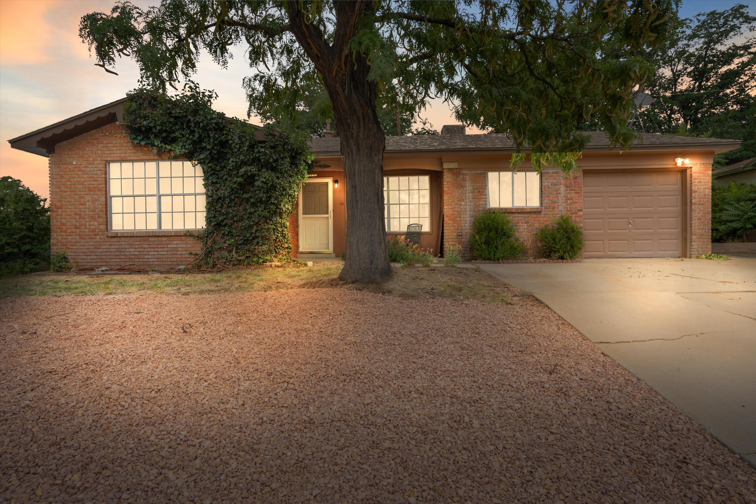 Located in a prime NE Heights location and highly desirable El Dorado high school district, this well-maintained 3 bedroom, 2 bath home is conveniently located nearby shopping, dining, and Kirtland Air Force Base. Inside, enjoy recent updates including a remodeled kitchen and bathrooms, new flooring throughout, a new water heater, and an upgraded 200-amp electrical panel. Bonus side yard access and possible RV parking! A perfect blend of comfort and modern upgrades in one of Albuquerque's most established neighborhoods!