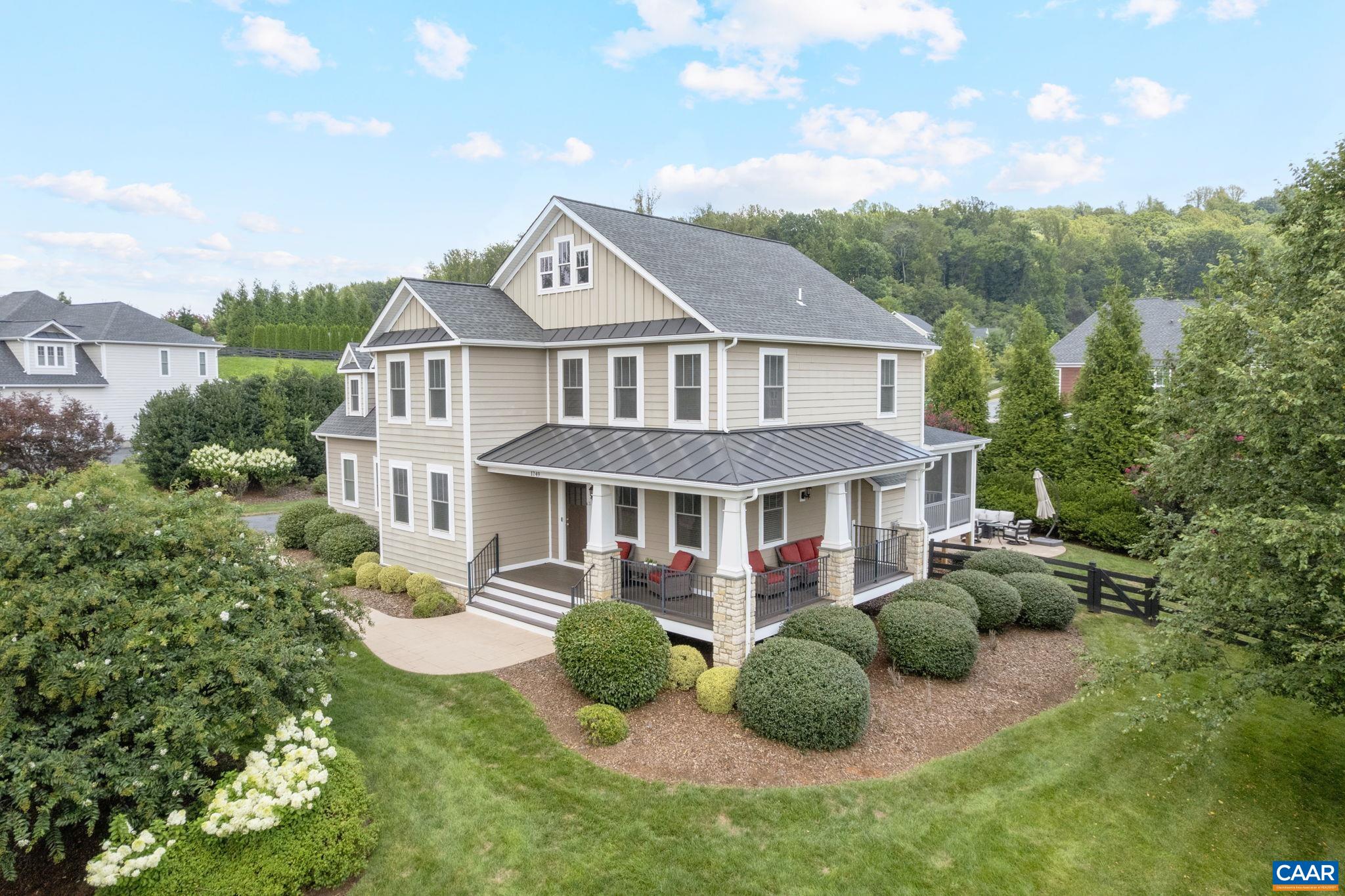 Beautifully updated in Hyland Ridge! Ideally located just minutes to Downtown Charlottesville, UVA and 64! This 5-bedroom home offers a flexible, functional floor plan and the current owners have completed recent major renovations: fully remodeled kitchen and pantry (2024), new light fixtures (2024), new carpet (2022), dual water heaters and whole-home filtration (2024), and a stunning primary bath remodel (2023). The finished basement (2023) adds versatile living space, including a 5th bedroom, currently used as a home gym, and an additional full bath. Enjoy outdoor living on the cozy screened porch(2023) or stamped concrete patio , plus a fully fenced and level backyard perfect for play or pets. Take in the serene views from the charming wrap around front porch. Thoughtfully improved and move-in ready, with tons of storage and a 2 car garage. A must see!