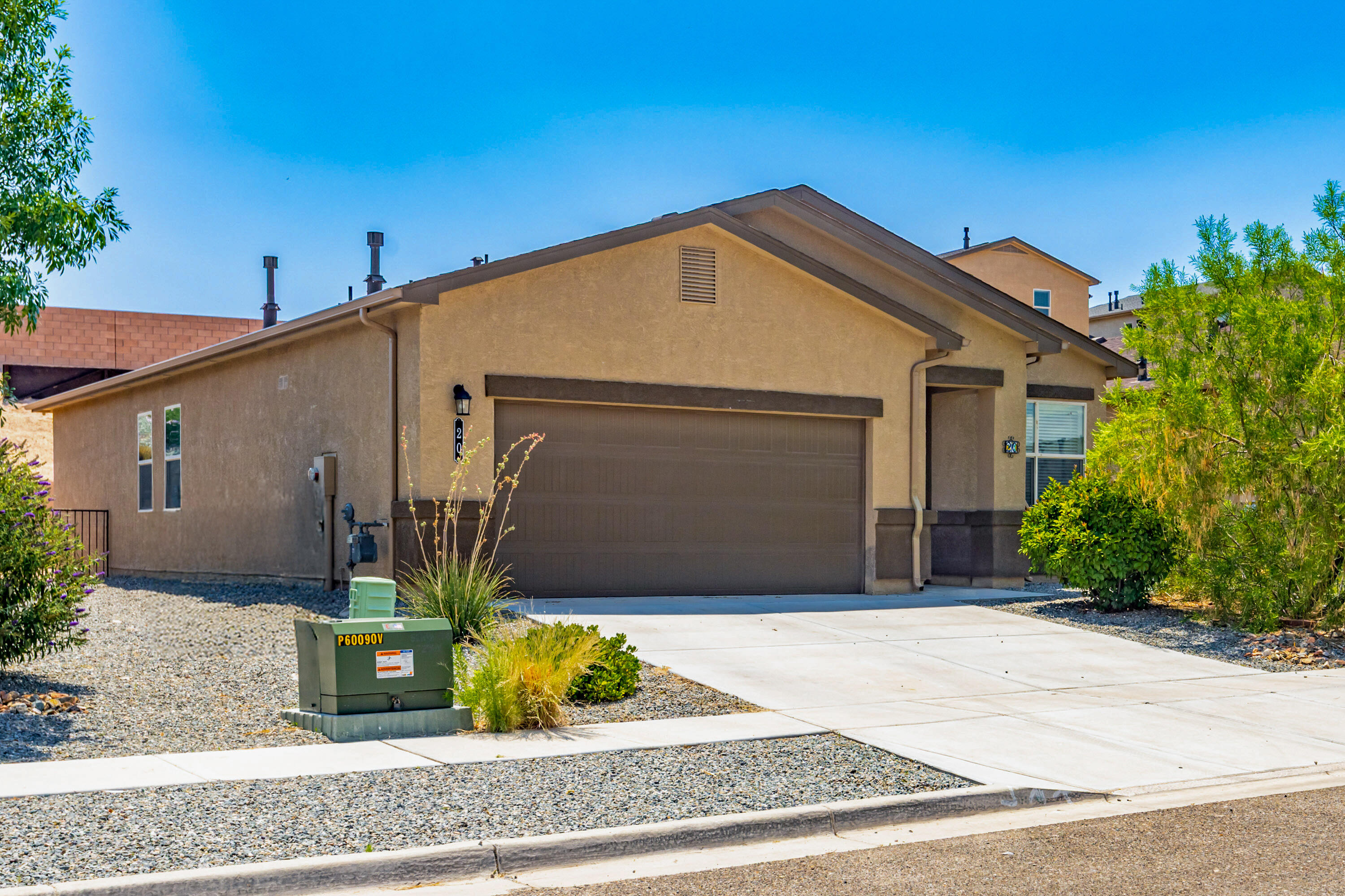 Nestled in a quiet cul-de-sac, this beautifully maintained home offers comfort, style, and functionality. The open-concept Jemez floor plan features 9-ft ceilings, abundant natural light, luxury laminate flooring, and dark cabinetry add that modern touch. The kitchen flows seamlessly into the dining and living areas--perfect for both everyday living and entertaining. The spacious backyard includes a two-level design with stairs leading to an elevated area, ideal for relaxing or enjoying sunsets. Xeriscaped front yard with auto-drip makes upkeep simple. Convenient to I-25, shopping, and schools.  This is more than a home--it's a lifestyle waiting to be enjoyed. Don't miss your chance to make it yours!
