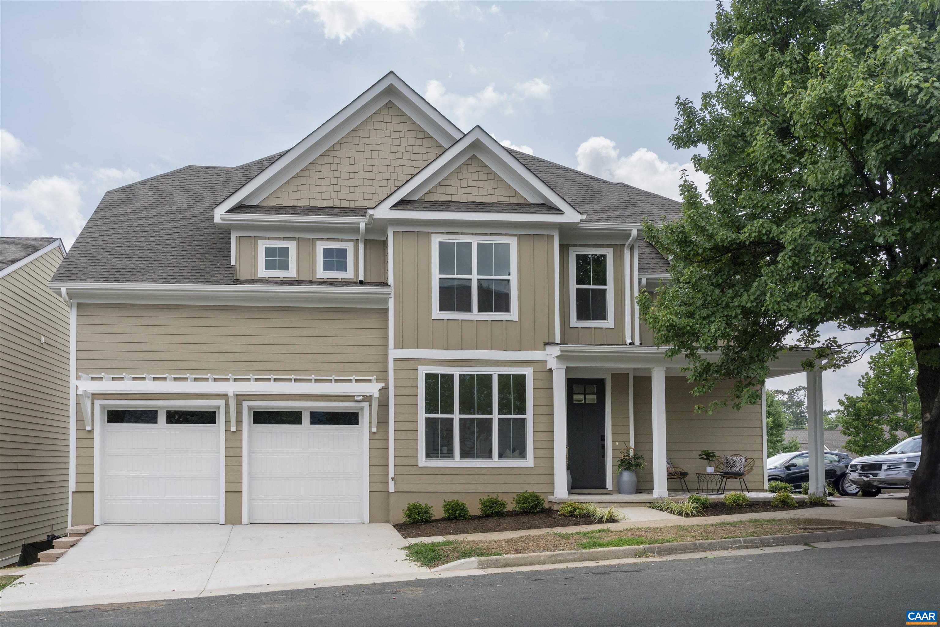 Welcome to 6306 Freedom Blvd, a rare, newly built gem in the heart of Crozet’s sought-after Wayland’s Grant. This modern home blends classic charm with contemporary finishes, offering an open-concept main level with abundant natural light, stylish LVP flooring, and a gourmet kitchen featuring quartz countertops and stainless steel appliances. Upstairs, you'll find four bedrooms—including a spacious primary suite with a walk-in closet and luxurious bath, a second bedroom with its own en suite, and two additional bedrooms that share a third full bath. Take in the beautiful mountain views from the rear of the home or relax on the back patio, perfect for outdoor entertaining. Located in the Western School District just minutes from downtown Crozet, Shenandoah National Park, and wineries—this home offers the perfect blend of community, convenience, and comfort. Don’t miss your chance to make it yours!