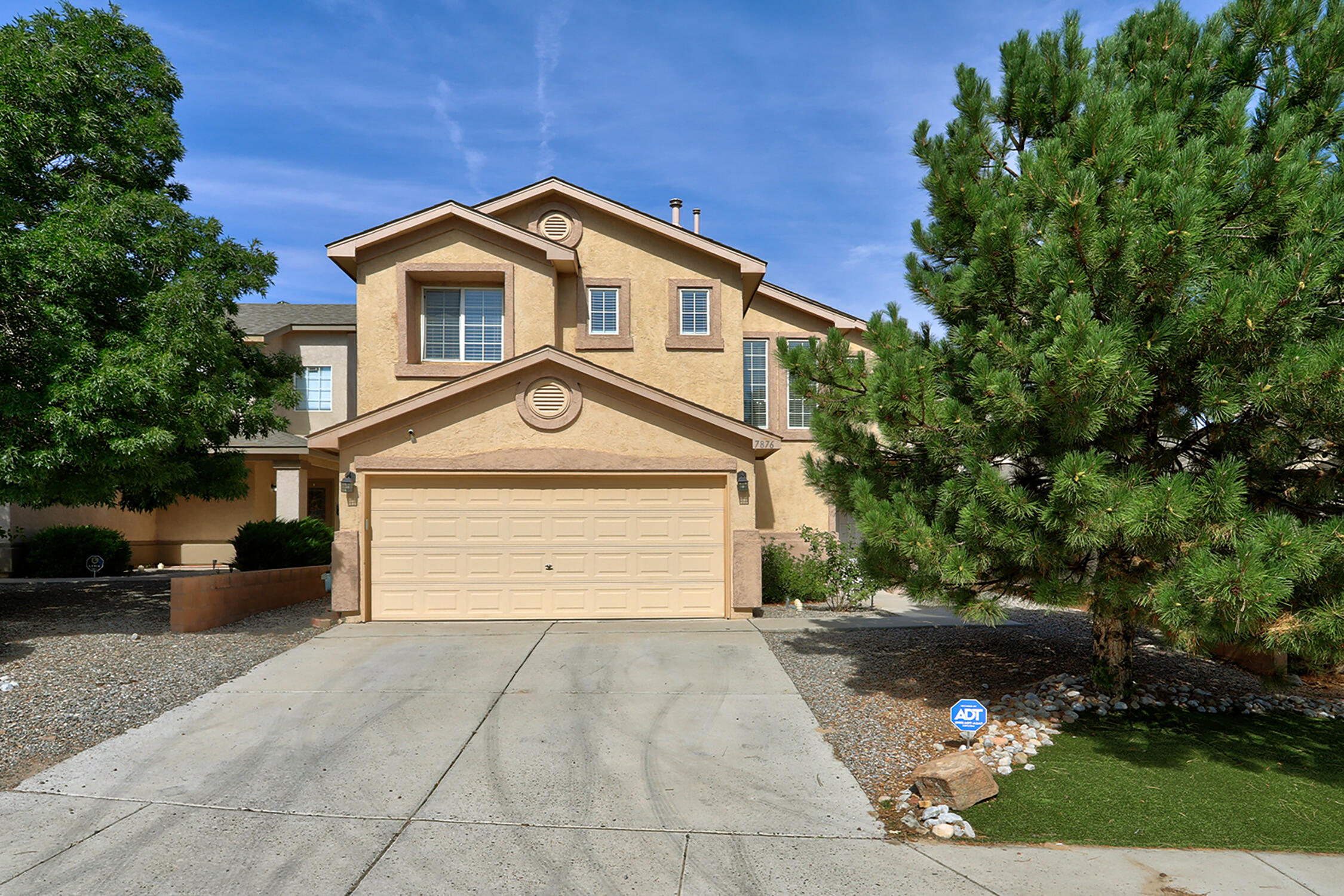 4 bed, 2.5-bath home with a functional floor plan, modern upgrades, and an entertainer's dream of a backyard, this one checks all the boxes. Newer wood-look tile flooring and a crisp, cool interior thanks to the upgraded ref AC, perfect for those warm NM days. The open-concept layout flows easily into the spacious kitchen and living area, making gatherings a breeze. Outside, you'll fall in love with the built-in grill and outdoor kitchen, covered patio, low-maintenance yard, and even a private basketball court -- yes, really! It's a backyard made for BBQs, birthdays, and buzzer-beaters. Additional features include a 2-car garage, easy access to trails, parks, and schools, plus a 1-year home warranty. Bonus:  assumable mortgage at an incredible 2.75% interest rate (buyer must qualify)