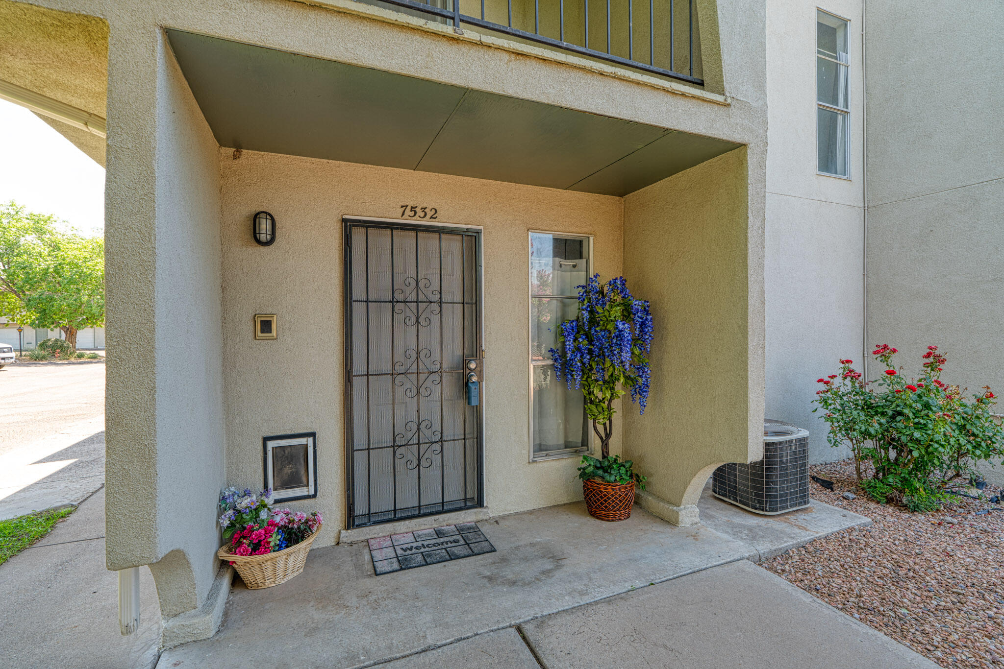 Complete with a Chair Lift to the main living space.  Open floor plan. Large Primary Bedroom with a walk-in closet. Move-In Ready. End unit townhome with peaceful and serene covered balcony in a park-like setting. New flooring and bedroom carpeting, fresh paint. Laundry room off kitchen with washer and dryer included.  HOA covers Clubhouse, swimming pool, exterior landscaping, roof, stucco, trash & water. Close to Arroyo Del Oso Golf Course, shopping, and dining.