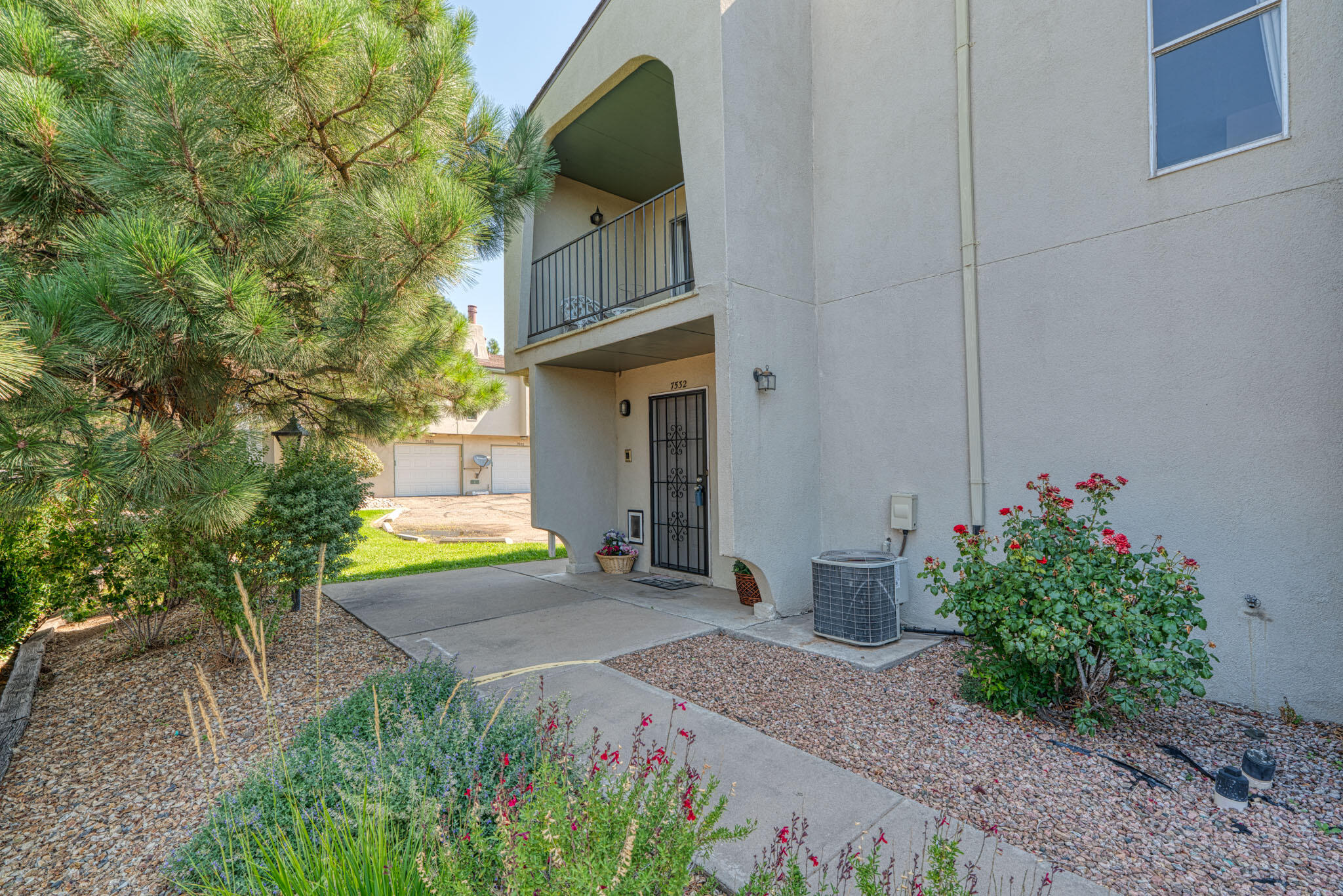 Complete with a Chair Lift to the main living space.  Open floor plan. Large Primary Bedroom with a walk-in closet. Move-In Ready. End unit townhome with peaceful and serene covered balcony in a park-like setting. New flooring and bedroom carpeting, fresh paint. Laundry room off kitchen with washer and dryer included.  HOA covers Clubhouse, swimming pool, exterior landscaping, roof, stucco, trash & water. Close to Arroyo Del Oso Golf Course, shopping, and dining.