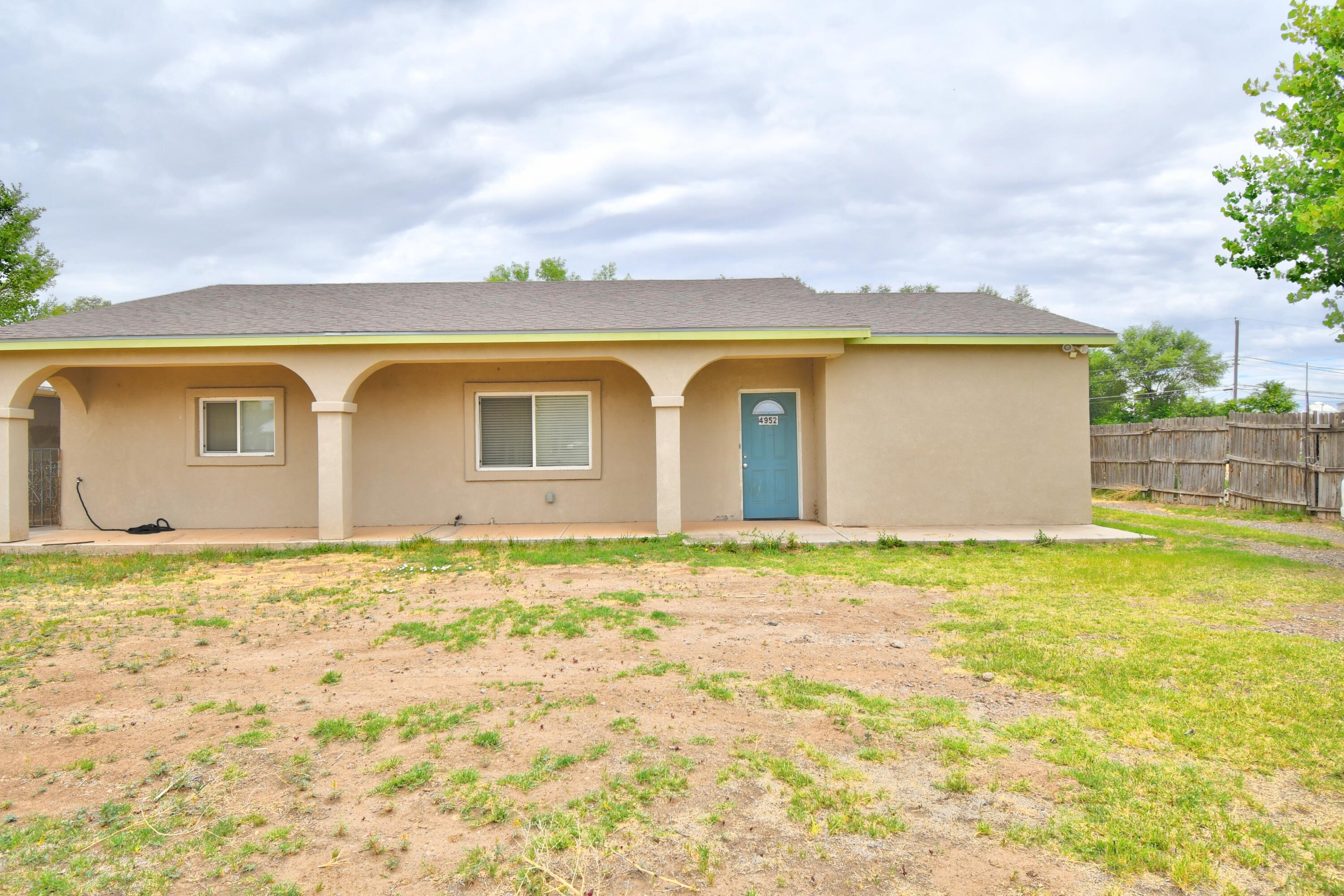 Charming 3-bedroom, 1-bath home located in the peaceful Los Chavez area of Los Lunas. Nestled on nearly 1 acre, this property offers ample space and privacy in a quiet neighborhood. The detached 24' x 30' garage/workshop is ideal for a handyman, mechanic, or hobbyist. Additional features include a water softener and reverse osmosis system for clean drinking water, as well as backyard access for convenience. A great opportunity with room to expand, work, or simply enjoy the space--don't miss out on this versatile property in a desirable location.