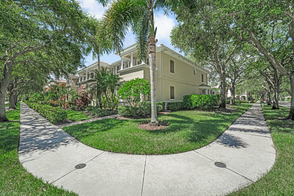 Welcome home to this impeccably maintained 3BR, 2.5BA end-unit townhouse in Tuscany at Abacoa! Feels like a single-family home with a spacious side yard. The kitchen boasts Kraftmaid cabinets, Silestone counters, and a charming bay window. Upstairs, the primary suite features a walk-in closet, garden tub, double sinks, separate shower, & private balcony. Enjoy custom LED lighting, luxury vinyl flooring, fresh paint, central vac, and screened patio with Chattahoochee deck,perfect for relaxing or entertaining.Detached 2-car garage, full hurricane protection, low HOA includes cable, internet, landscaping and resort-style pool, fitness center, clubhouse, and trails. Prime location near downtown Abacoa, Roger Dean Stadium, FAU, Scripps, A-rated schools, beaches, shopping, and airport.MUST SEE!