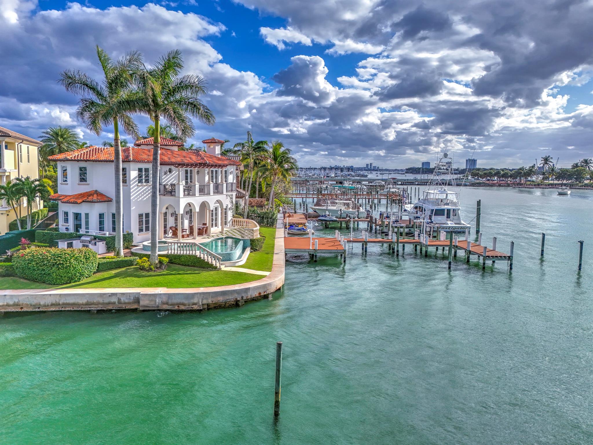 Direct intracoastal views. This 4 bedroom, 5 bath, office & den home offers water views from every room. Enjoy serene sunsets while enjoying your favorite drink with dinner on the outdoor patio. Only gated private home community on Singer Island. 150 feet of waterfront, 40,000 lb boat lift, room for other large boat(s) and jet skis. Within 15 minutes of downtown West Palm and Palm Beach Gardens...Accepting backup offers until current offer is pending.
