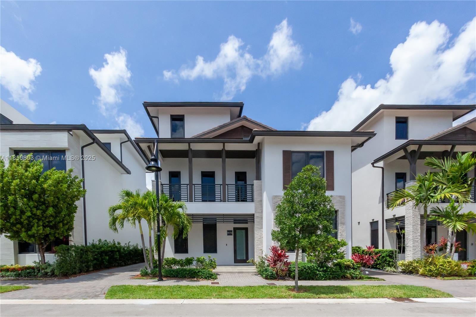 Designed for both comfort and luxury, the home features hurricane-proof windows and doors, elegant marble floors, an airy layout with soaring ceilings and a sleek open stairwell accented by plexiglass handrails. Natural light floods every room, enhancing the modern finishes throughout.

The chef’s kitchen features an upgraded marble island, top-of-the-line appliances (including premium oven, stove, microwave), and a built-in wine fridge. The home includes three walk-in closets.  A massive walk-in closet in the master suite, offering luxurious storage and dressing space. Each bedroom includes its own private en-suite bathroom, and the home is complete with multiple balconies, elevated outdoor patios, a long driveway, and a brand-new custom pool.