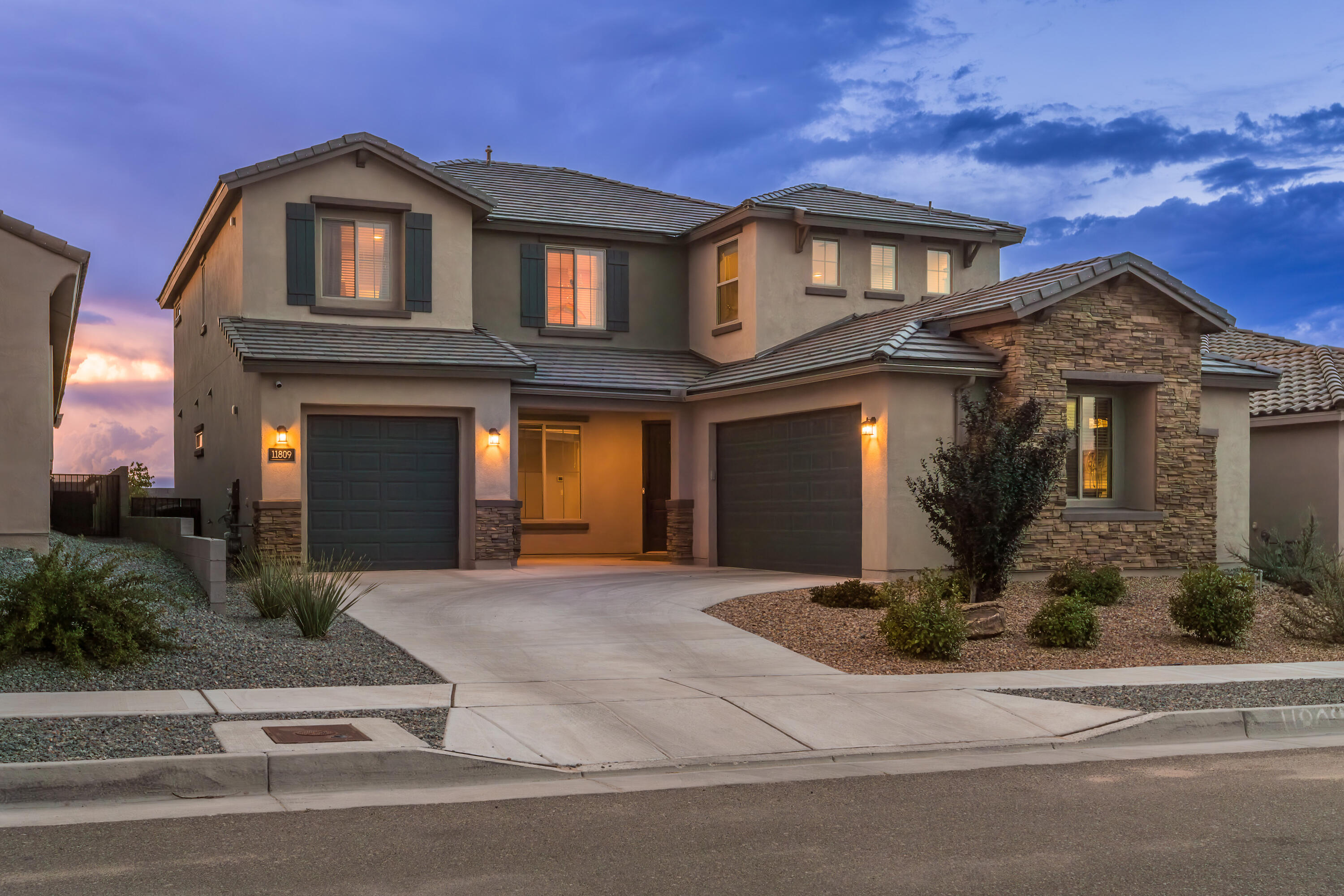 Forever VIEWS from this impressive Pulte Starwood model in the gated subdivision of Inspiration.  Home built on premium lot backing to the Petroglyph National Monument. Sellers added many upgrades throughout this gorgeous home featuring 4 bedrooms plus an office, flexible space with a Pulte planning center and game room. Dream kitchen features Quartz counters, maple cabinets, walk in pantry and butler's pantry.   Floor plan flows nicely through home that has lots of natural light.  Primary BR has double sinks, spacious walk in closet, and sizable walk out balcony providing amazing views of sunsets, mountains & city.  Professionally landscaped front and back yards with drip irrigation, area for gardening and covered patio. EV Plug in single side garage. Convenient access to I-40, Unser &