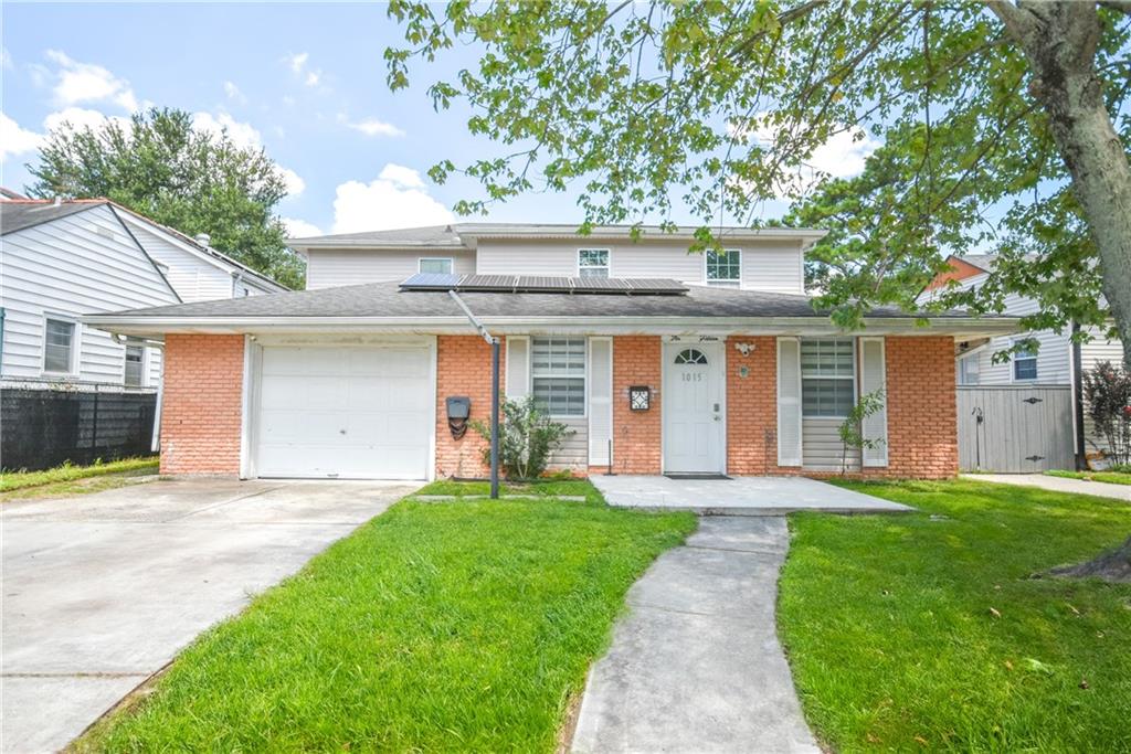 Welcome to this beautifully updated, two-story home nestled in a quiet, established neighborhood in a convenient Metairie location. Step inside to discover a thoughtful layout with multiple living spaces, generous natural light, and tastefully updated finishes throughout. The main kitchen features stone countertops, ample cabinet space, and a functional flow for everyday living and entertaining. With 6 spacious bedrooms (one currently used as a dining room), 4 full bathrooms, and tons of storage space, this move-in ready property charms, with allure for small, large or multi-generational households. 
The unique floorplan features each floor having 3 bedrooms, 2 full baths, a kitchen, and living room spaces! The main level has one bedroom, living area, and bath with a mini-kitchenette, that is separated from the rest of the home, with its own entrance for multiple possibilities - mother-in-law suite, guest quarters, or additional income! 
Outside, enjoy a low-maintenance and spacious backyard with subsurface drainage - perfect for relaxing in the pool, coffee or meals on the deck, playtime, or entertaining. A large driveway and a garage allow for ample parking, and energy efficient solar panels help keep the utility bills down!   
This home offers both comfort and accessibility, located right by Sam's Club and Elmwood Shopping Center, it's a quick trip into Old Metairie and New Orleans, with multiple thoroughfares (Airline Dr, Earhart Expy, and Causeway Blvd) under 5 minutes away. Schedule your private showing today!