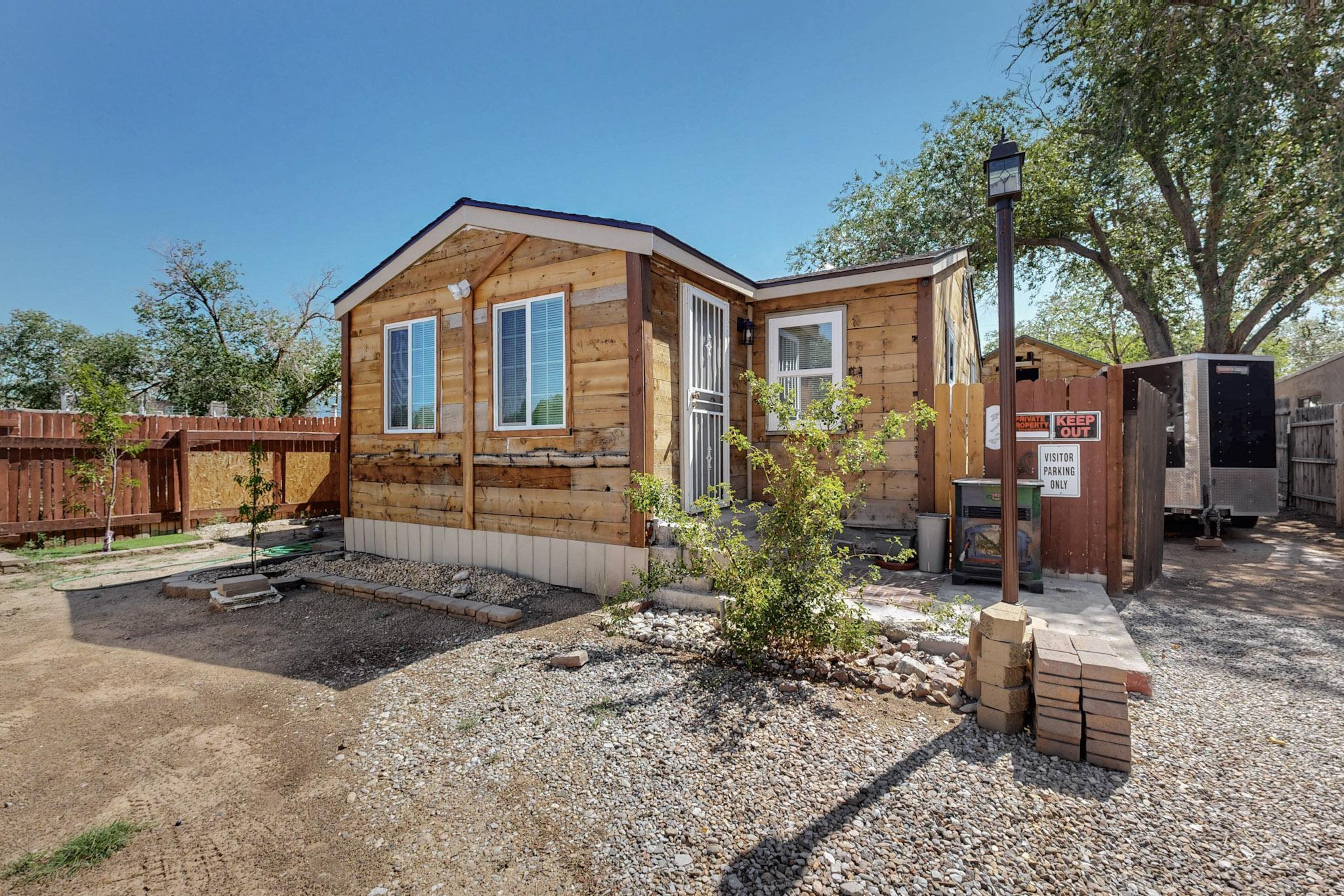 Charming 2 Bed, 1 Bath waiting to be called home. Imagine stepping into this bright beauty. Totally refreshed from top to bottom and ready for you to move in. Whether you're purchasing as a first-time buyer, downsizing, or seeking a rental property opportunity, this cozy home is waiting for you. Property renovations include newer roof, flooring, plumbing and some electrical. There is also the renovation potential for the onsite casita that already has a newer roof. This prospective space could be for extra income or extra living space. City & commuting perks include close to transit, major employers, and cultural destinations. Entire property is fenced and gated. Don't miss out on this gem, where comfort meets potential!