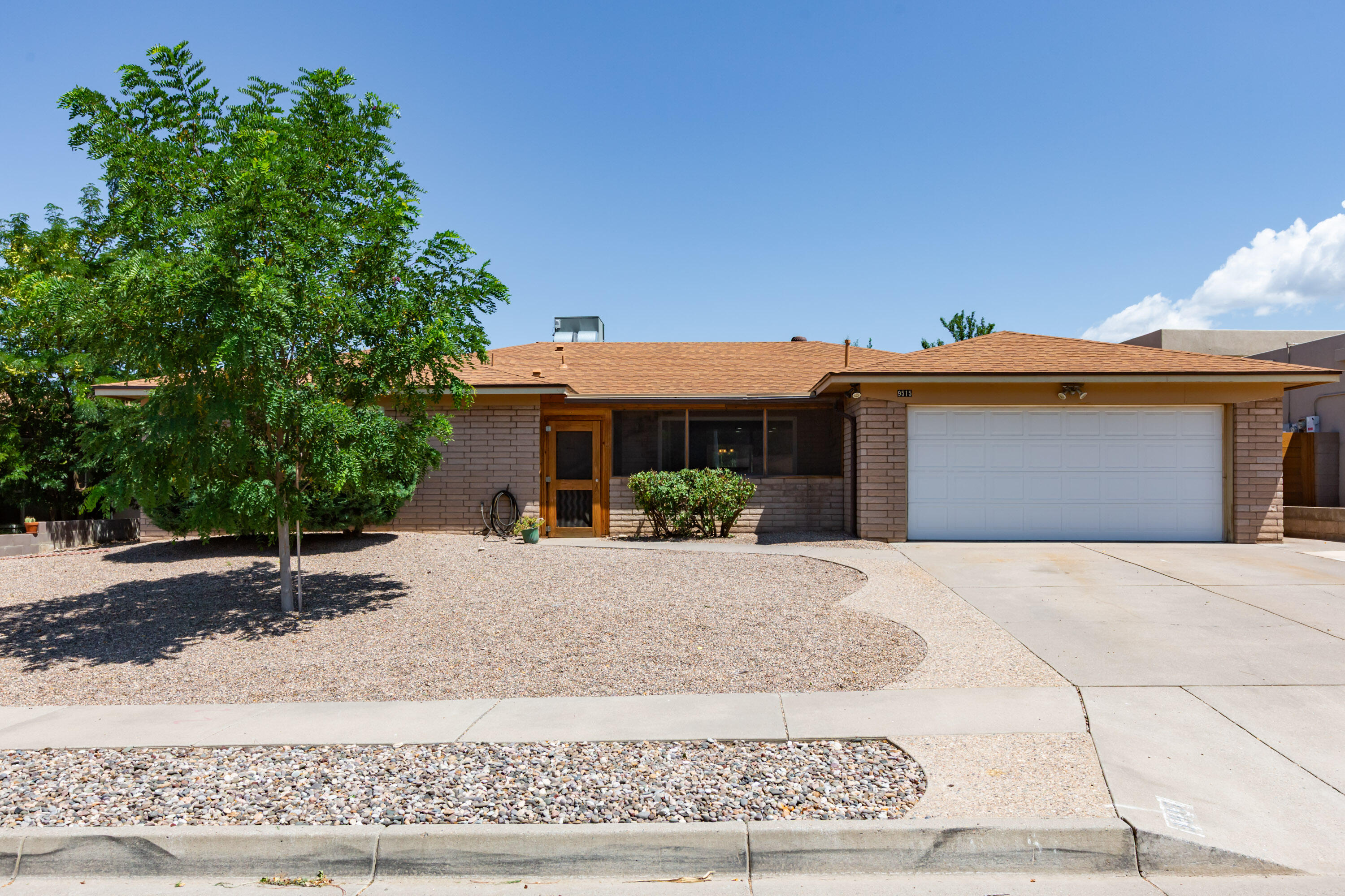 Welcome to this rare find in the desirable La Cueva school district- over 2,300 sqft, 4 bedrooms, and 2.5 baths under $500k! This spacious home features a beautifully updated kitchen with quality appliances, a large island, quaint breakfast nook and an open concept floor plan perfect for a variety of layouts. Enjoy privacy outside with no back neighbors and mountain views. The charming enclosed patio is ideal for your morning coffee or relaxing with a book. Additional perks include: refrigerated air, newer windows and a 6-year old pitched roof- all in a desirable neighborhood in the NE Heights. Don't miss your opportunity to get into this location at an affordable price-point. Recent appraisal at $527,000 (4/2025). Make it your's today.