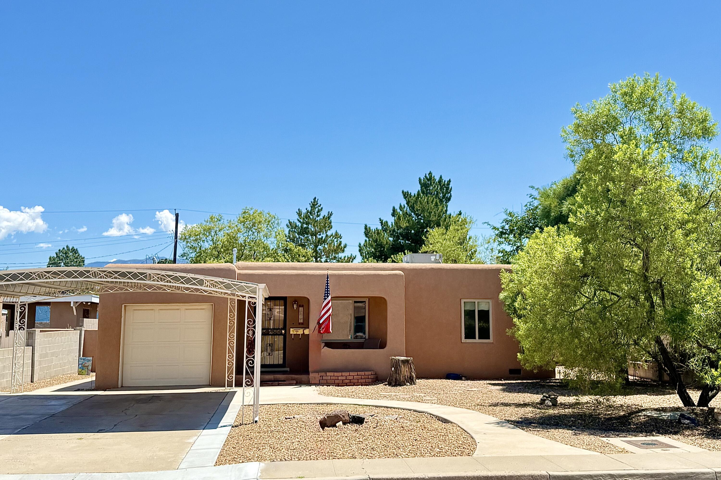 Charming & Move-In Ready in the Heart of Albuquerque!Discover this beautifully maintained, feels-like-new gem nestled in one of Albuquerque's most convenient and established neighborhoods. This home offers a remodeled kitchen, two comfortable bedrooms, both with cedar-lined closets, a full bath, gorgeous original and resurfaced hardwood floors, and generous parking, including a 1-car garage and a 2-car carport--a rare bonus in this price range.Step outside to enjoy professionally designed Southwestern xeriscape landscaping in both the front and backyard--stunning, water-wise, and low-maintenance.Inside, enjoy year-round comfort with newer refrigerated air and the security of a membrane roof installed in 2018. A recently installed new water heater adds to the list of...