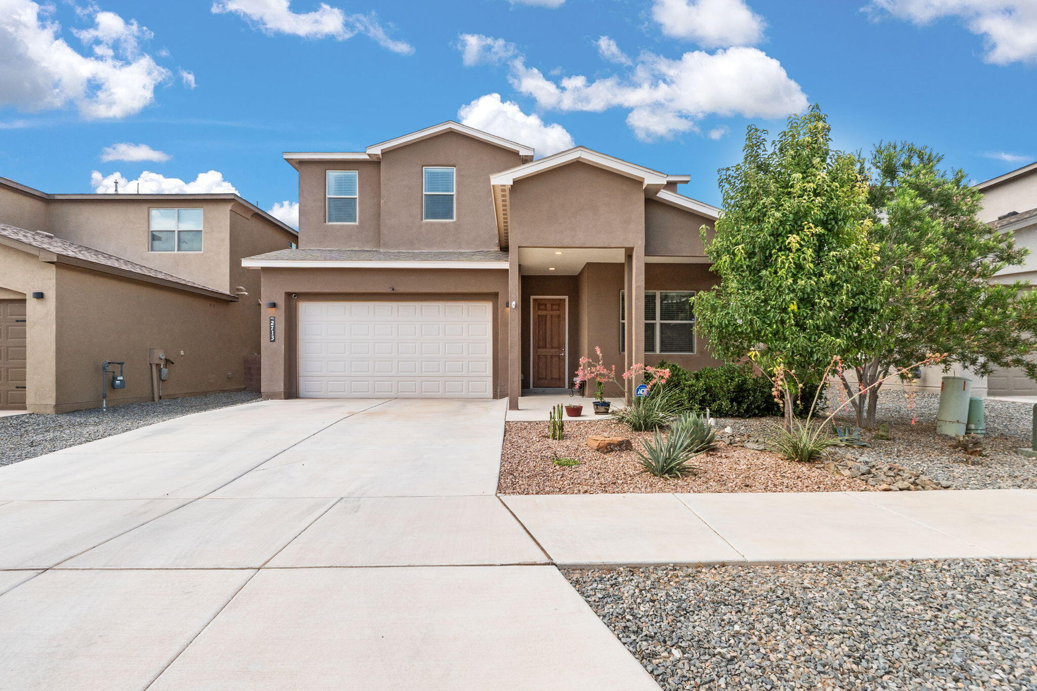 Rare Find in Rio Rancho! This spacious 4-bedroom + office + loft home offers the perfect blend of function and flexibility--ideal for multi-generational living with a convenient downstairs bedroom and 3/4 bath. The open-concept living area flows seamlessly into a modern kitchen featuring granite countertops throughout. Upstairs, you'll find additional bedrooms, a versatile loft, and ample storage space. Enjoy refrigerated air for year-round comfort. Step outside to an extended covered patio and custom-built play set--perfect for entertaining or relaxing. Move-in ready and full of thoughtful upgrades--don't miss this one-of-a-kind opportunity!