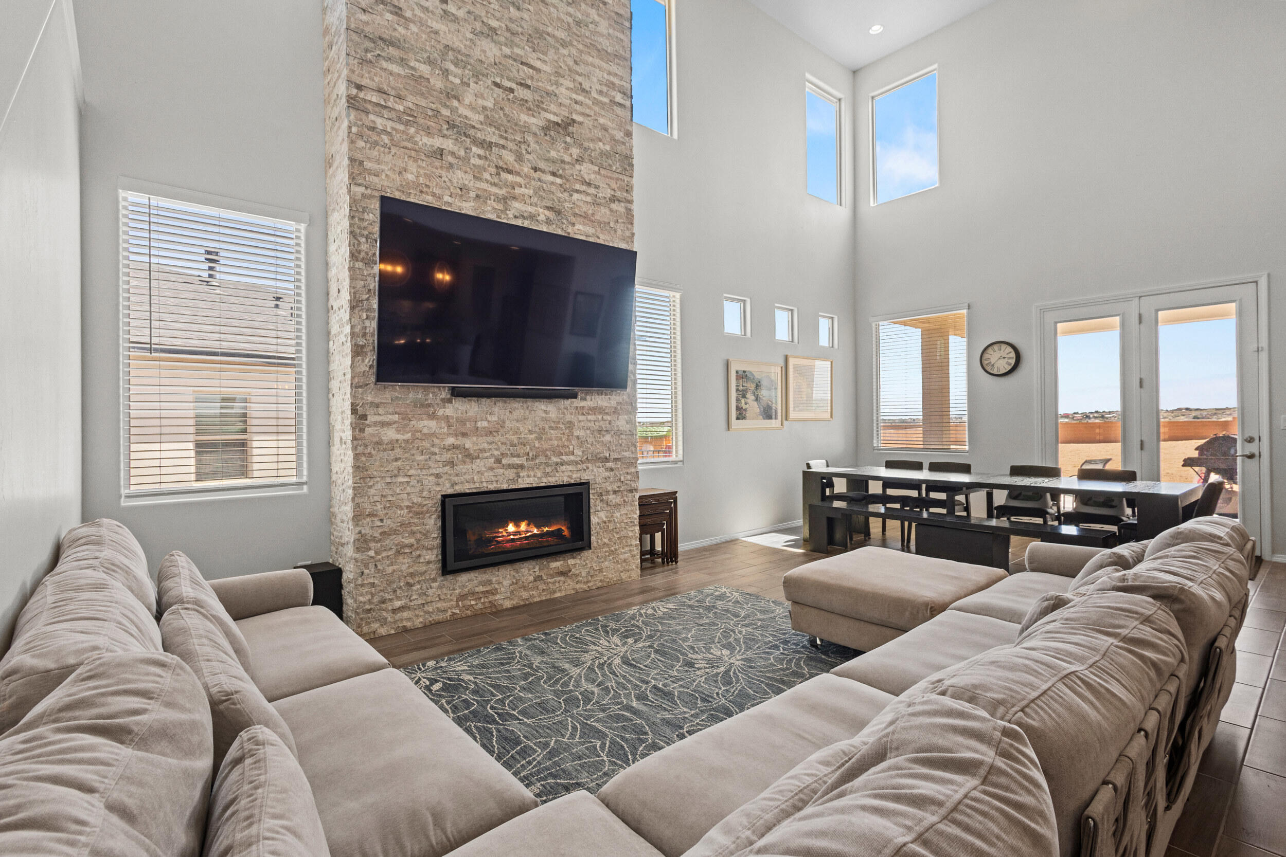 Enjoy the mountain and city views from this well maintained 5 bedroom home in Rio Rancho, featuring the popular Caballo floor plan by Hakes Brothers. Thoughtfully designed with space and function in mind, this two-story home offers a bright, open-concept living area, flexible upstairs loft, and a large backyard ready for your personal vision. The spacious primary suite is privately located and includes a walk-in closet, dual vanities, and a separate soaking tub and shower. Perfect for unwinding after a long day! Additional highlights include recessed lighting, modern finishes, a separate laundry room, and a 2-car garage. Located in a growing community with convenient access to schools, shopping, and recreation, this home blends comfort, space, and views into one incredible opportunity.