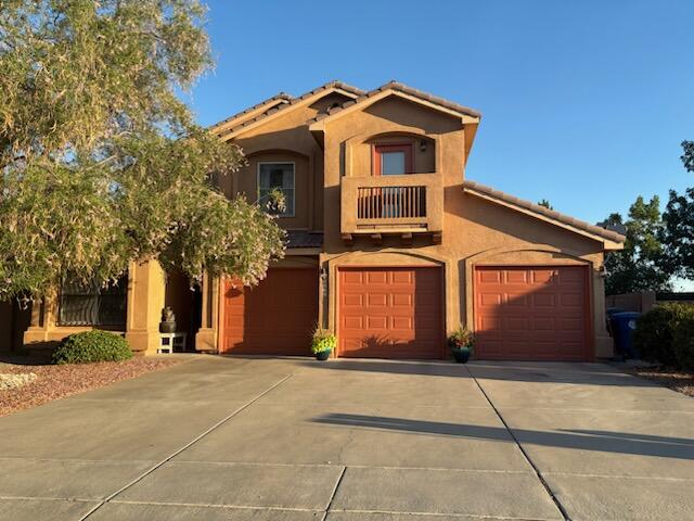 This beautifully updated two-story home in the highly desirable Rinconada Trails neighborhood blends timeless Southwestern character with modern finishes. Featuring a classic stucco exterior, tiled pitched roof, and warm regional detailing, it reflects New Mexico's architectural heritage with fresh, contemporary style. Inside, enjoy soaring ceilings, a traditional kiva-style fireplace, and an open-concept layout. Spacious with 5 bedrooms, 4 baths, and no HOA. Recent updates include a fully remodeled kitchen, new appliances, updated fixtures, fresh paint, new hardware, baseboards, and refreshed xeriscaping with rain barrels. Come experience this elegantly finished home--ready for you to make it your own!