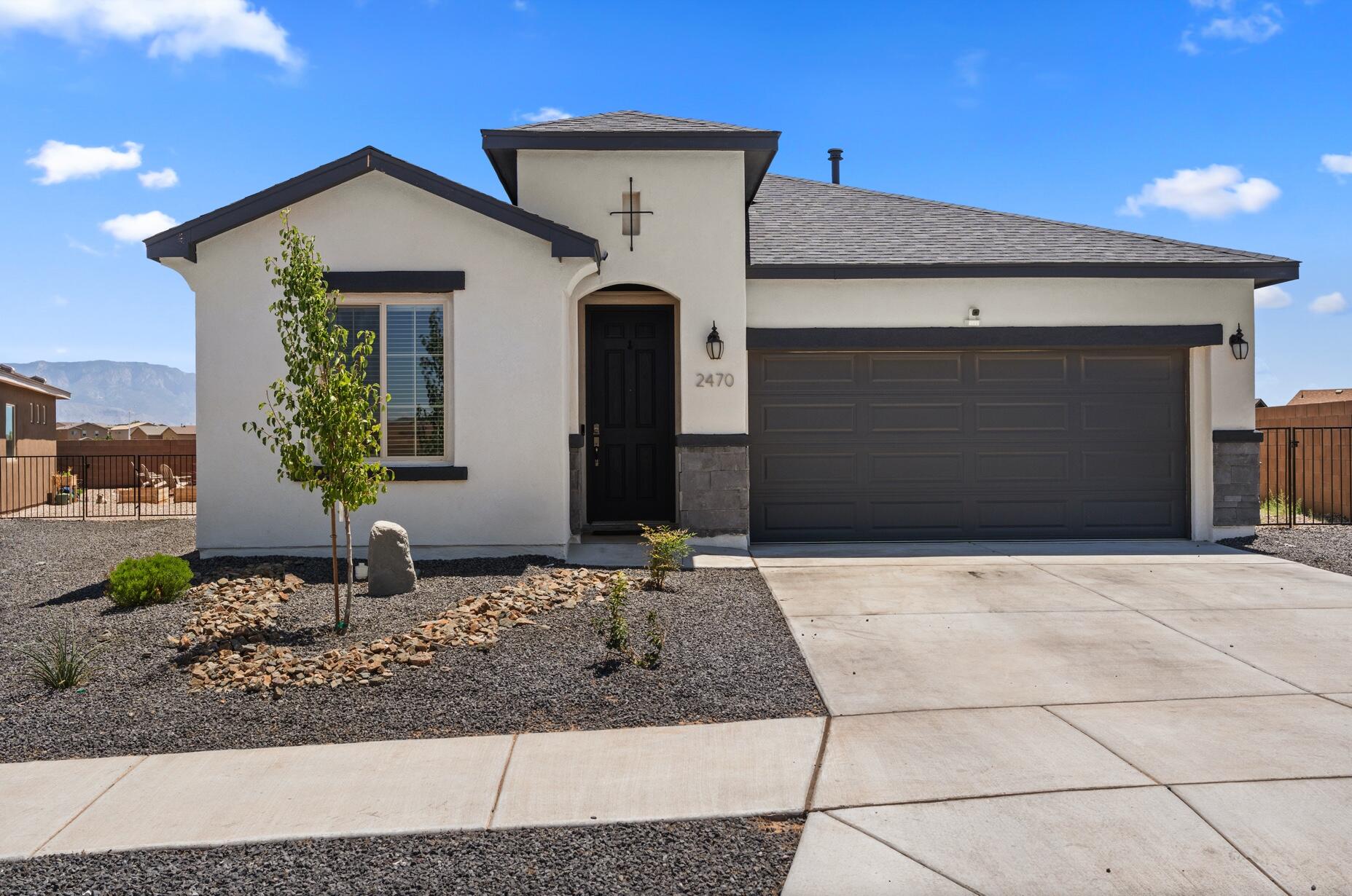 Discover this stunning 4-bedroom Hakes Brothers home in the desirable Melon Ridge subdivision, situated on the largest lot in the community with breathtaking views of the Sandia Mountains. Thoughtfully updated with tasteful aesthetic touches and meticulously maintained, this home offers both style and comfort. Home also has EV charger outlet in garage and in wall pest control system! Blinds installed throughout property. No PID! Enjoy the space, views, and serenity--all with $15,000 in flex cash offered by the seller to help with rate buydown or closing costs. Don't miss this exceptional opportunity!