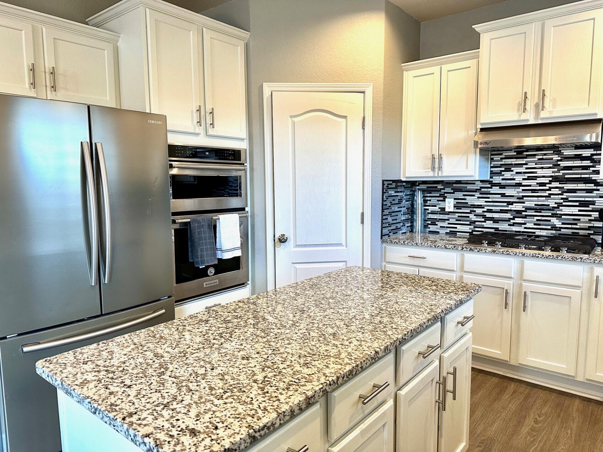 Move-In Ready, Views all around from many of the rooms upstairs, raised ceilings, Open concept Family room, kitchen dining, plus a stacked stone gas fireplace. Modern kitchen with granite counters, canned lights, farm sink, RO water system, mosaic tile back splash, vent hood, gas cooktop, large pantry, island, breakfast nook. Bonus storage under the stairs. Well appointed spacious primary suite with large walk-in closet, Separate shower, soaking tub and dual vanity. 2 additional bedrooms, Full bath and Loft with vaulted ceilings offer natural light throughout but black out blinds included. Enjoy low maintenance front and back yard landscape. Extras: Refrigerated air, high end vinyl plank flooring downstairs, nest thermostats, oversized 2.5 car garage.
