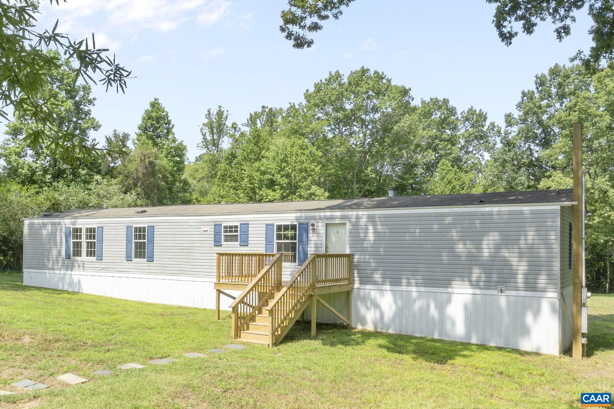 Perfect opportunity for first time homebuyer or investor.  This lot has 2 addresses so there is room for a second home.  Live in current home while you build your dreamhouse or build a second investment home on this level 4.10 acre lot just minutes to downtown Scottsville and Charlottesville.  Home has been totally renovated.  Kitchen features white cabinets with granite countertops.  Beautiful lvp flooring throughout the home.  4 bedrooms 2 new full bathrooms including primary suite. Spacious bright home.   There are 2 divisioin rights on this lot so a second home can be added.