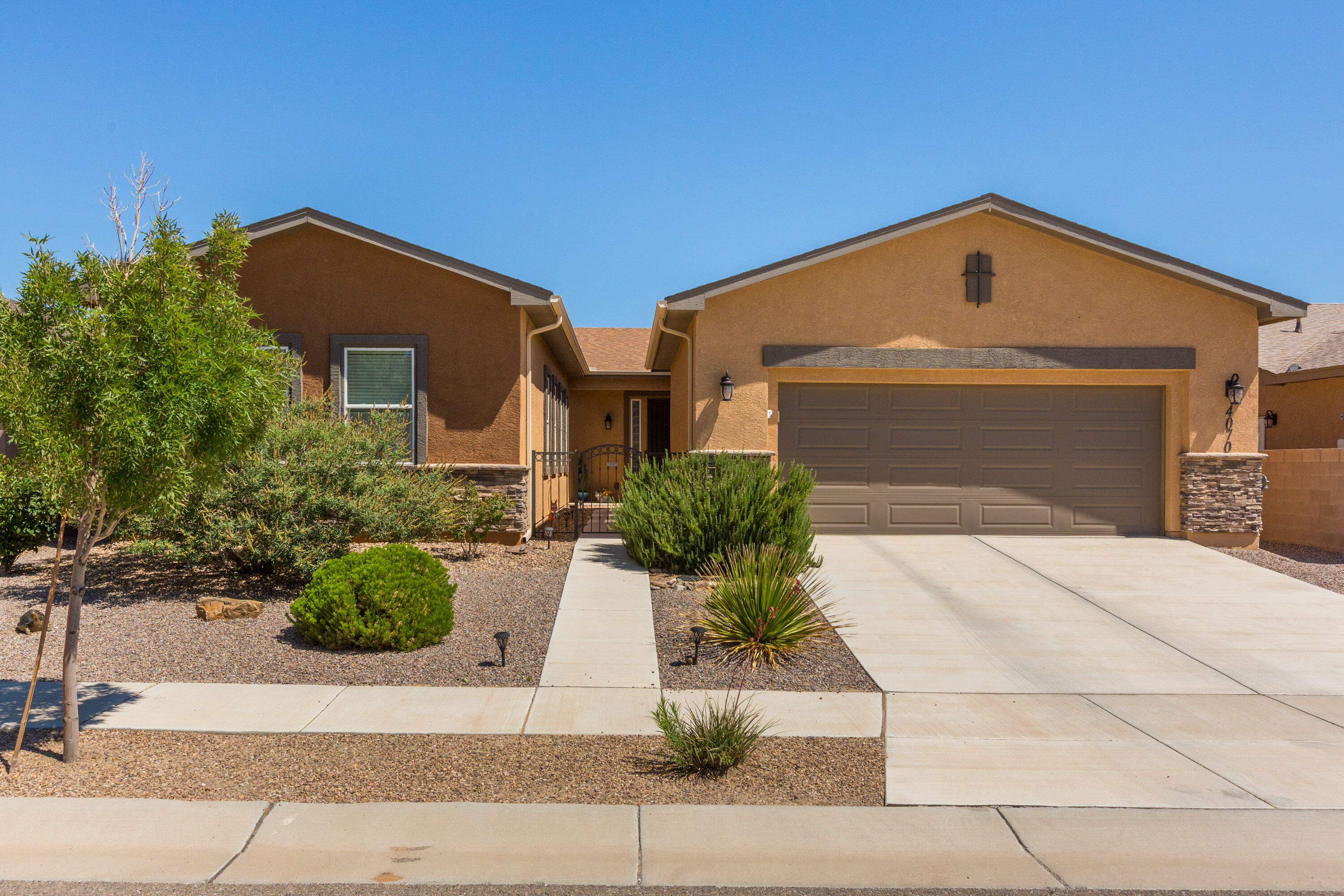 Gorgeous Home built in 2019 located in the Active Adult Community of Jubilee in Los Lunas!! This over 2250 sf home offers a Spacious Primary Suite & bath includes Zero Threshold Shower w/tile surround and grab bar, DBL sinks & huge  WIC!! Nice Sized Second En-suite & a full bath! There is a 1/2 bath too! Office w/French Doors, Large Living Room, Open Kitchen w/ Granite Countertops, Plenty of Cabinetry Space & Pantry. All Appliances stay! LVP Flooring in Office, Kitchen, Dining & Hallways!!  Oversized Garage is 23.10' X 29' complete w/Mud Sink, Shelving & Workbench!! You'll love the private backyard with a large covered patio!  Enjoy the beautiful Clubhouse which includes daily activities, Gathering Room, billiard room, library, full gym, Jr Olympic Size Outdoor Pool & Jacuzzi & more!!