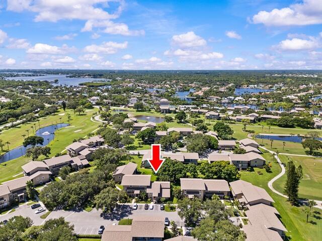 PERFECT TURN-KEY GOLF CONDO!!  Everything is NEW and ready for you, with a couple of nostalgic appliances.  New A/C, New HURRICANE WINDOWS & SLIDERS, 2 New BALCONIES, New ROOF, New INSULATION, New APPLIANCES, New REMOTE-CONTROL SHADES, New FRONT DOOR, & New PAINT, too!!   Perfect location with private golf course, heated pool, canoes on the intracoastal, private tennis and pickleball courts, close to beaches, shopping, dining, and everything.  NO SPECIAL ASSESSMENTS!  Two assigned parking places, plenty of guest parking.  Private Storage Unit.   Relax and feel the fresh air.  Have a beverage on one of the balconies.  Toast your fabulous find and your HIDDEN GEM IN JUPITER!