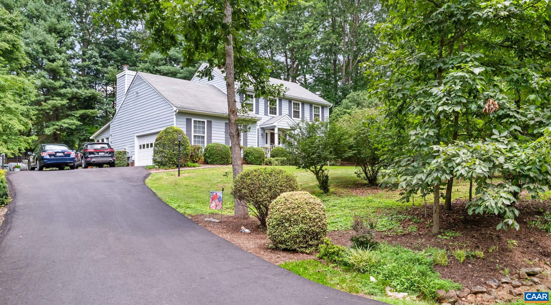 The home you've been waiting for!  Fabulous Loftlands Wood in Earlysville, 4 bedrooms, 2 1/2 bath, gorgeous landscaped lot, and one of the best walkable neighborhoods around!  2 car garage and large garden shed provide all the space most will need.  But it's the Garden Room that knocks your socks off... a beautiful space overlooking a lovely backyard.  From the garden room there is a nice gathering deck and hot tub.  The living space is wide open, one area flowing beautifully into the next.  The large living room is currently used as a formal area, and there are so many options for its use... a library comes to mind, such nice light for reading!  There's a lovely dining room right off the kitchen.  Upstairs, there are 4 bedrooms and 2 full, updated bathrooms.  Really, just a great house. Moments from Hollymead Square and multiple local wineries, along with hikes at Ivy Creek Natural Area.  And don't forget, there's an Earlysville 4th of July Parade!  Loftlands Wood and The Glen at Loftlands share the enjoyment of a very nice lake, as well.  So bring your kayaks!