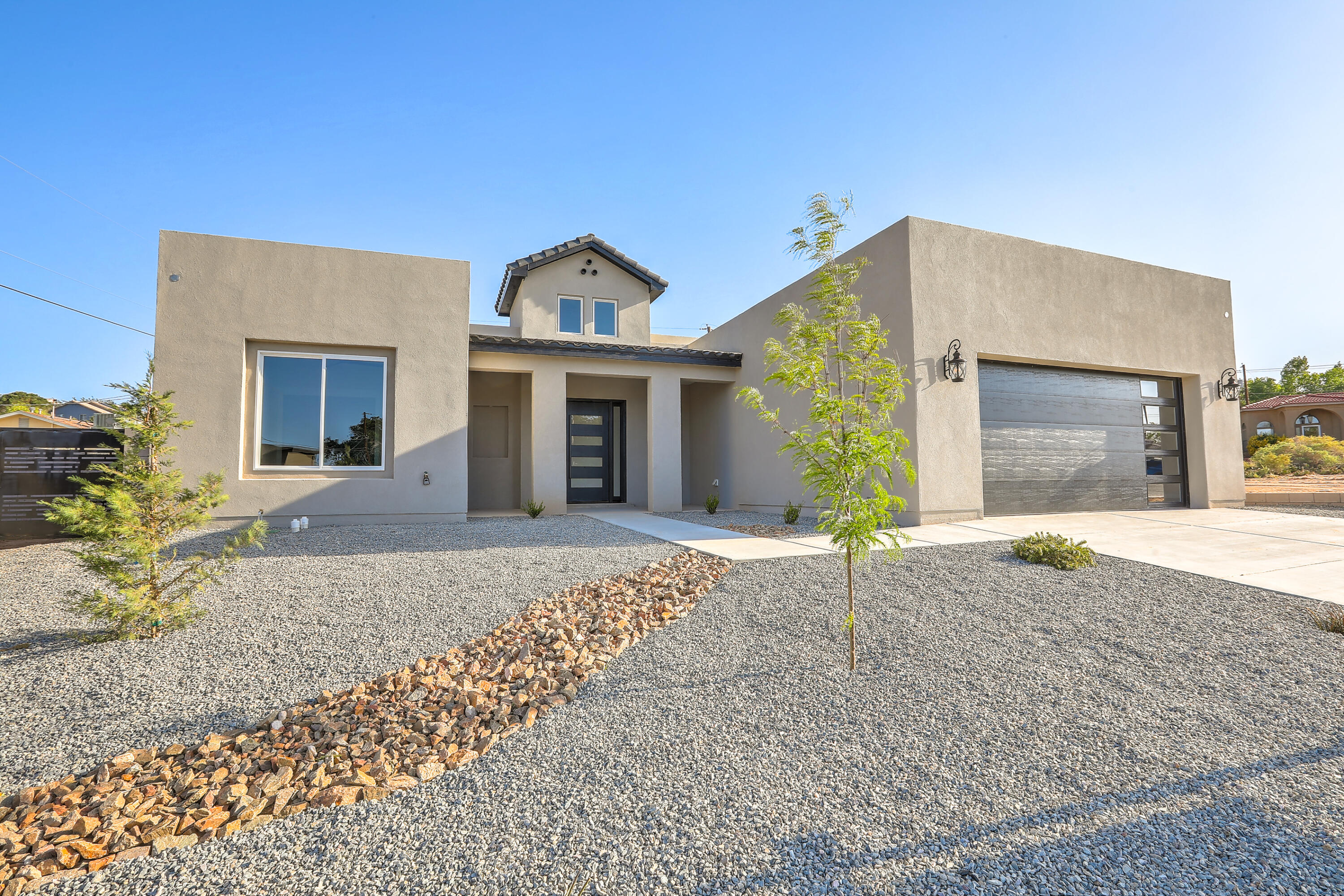 Welcome Home ! Let's enter this beautifully designed modern meets contemporary new construction home!. Within its walls, you'll find a treasure trove of space, with an expansive open floor concept anchoring the heart of the home. Storage is plentiful with with a sprawling two-car garage and abundant closets ensuring that every item finds its place. Say hello to not just a house, but a sanctuary of serenity and excitement. Your new home awaits!