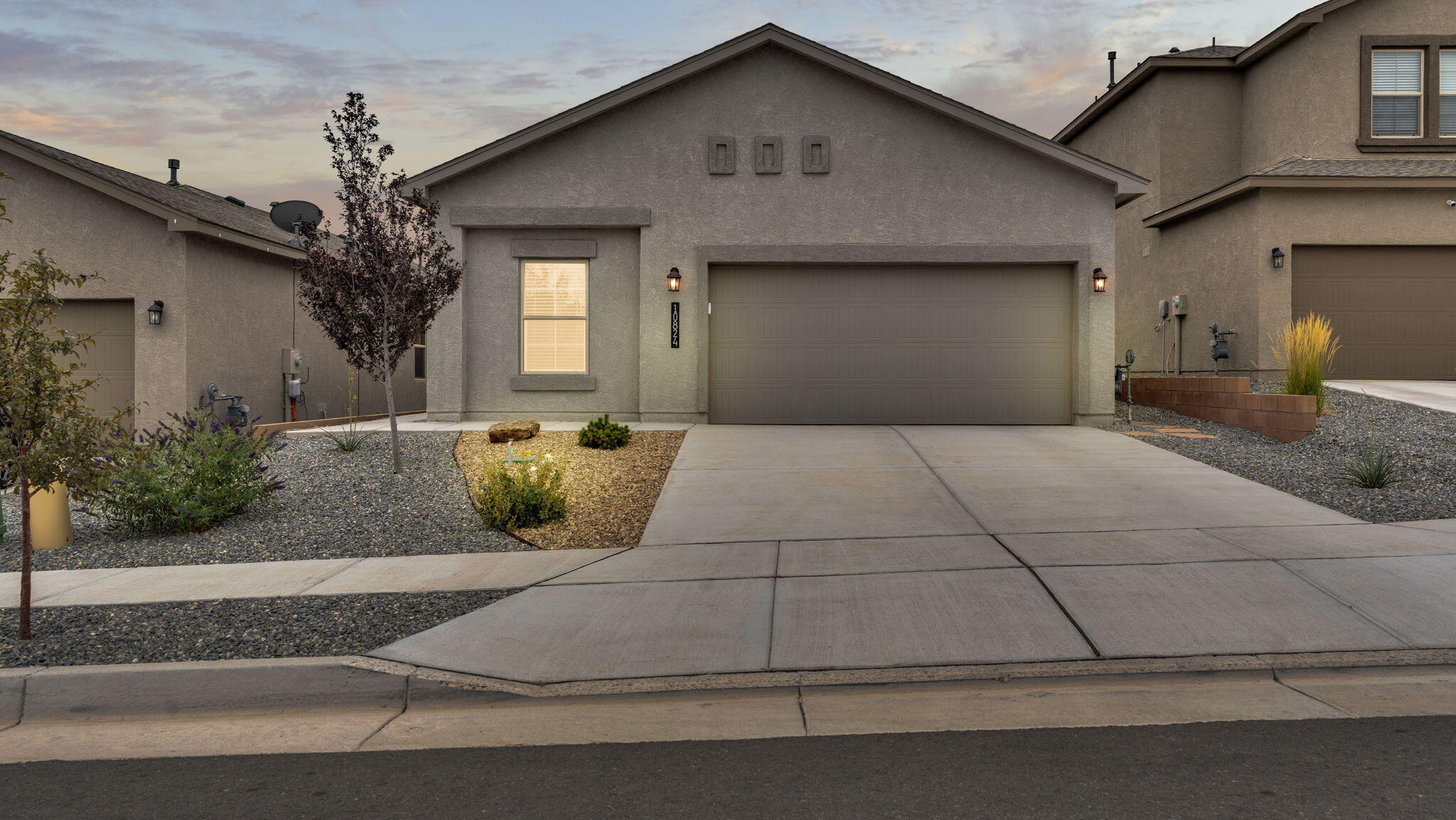 Move in ready home with $5,000 closing cost credit! 4 beds, 2 baths, 2-car garage. Open layout with a spacious great room, dining area, and elegant kitchen featuring granite counters, island, walk in pantry. All Appliances are upgraded from builder models and are 1 year old.Ceramic tile in kitchen, dining. Primary suite includes raised double vanity, walk-in shower, and large walk-in closet.Smart home features, pitched roof, refrigerated air, low-E windows, and a fully landscaped backyard.Seller is offering a $5,000 credit toward closing costs -- don't miss out! Move-in ready and built for comfort!