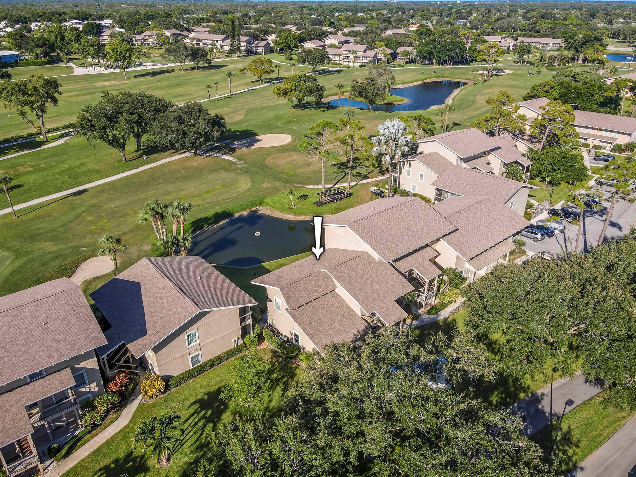 GOLF, TENNIS & PICKLEBALL INCLUDED! Fabulous one-level condo has gorgeous golf and pond views from two porches directly on the beautiful course at Rverbend! Owners enjoy terrific amenities including 3 Har Tru tennis courts, 4 Pickleball courts, spa-like pool plus golf privileges on a Fazio 18h course. Your 2/2, premium, first floor condo features an updated kitchen with white Shaker cabinets & tile backsplash. Main space and balcony is under renovation and new owner will be able to CHOOSE YOUR OWN FLOORING AT NO ADDITIONAL COST! This is an incredible value in the Jupiter/Tequesta area. Gated and beautifully manicured area. Heated pools by the river. Charming clubhouse and winding streets for walking/jogging/biking. IMPACT Sliders. 2024 Roof. Don't miss this special opportunity!