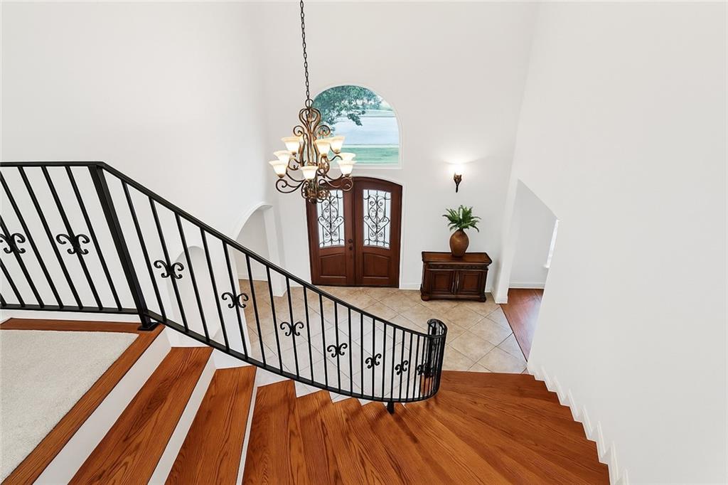Beautiful Traditional Home in Lakeview!
This charming home welcomes you with a grand 2-story foyer and sweeping staircase. Features include a formal dining room with wood floors and crown molding, a butler’s pantry, and a gourmet kitchen with granite counters and commercial-style stainless appliances.
Enjoy a spacious family room with a gas fireplace and wet bar—great for entertaining! A downstairs office with full bath offers flexible space as a guest suite or 4th bedroom.
Upstairs you'll find a large primary suite with walk-in closet and spa bath, two more bedrooms, and a full laundry room.
Outside: covered brick patio, hot tub under a pergola, fenced yard, 2-car open garage, and storage.
This Lakeview gem has the space, charm, and layout to check all your boxes! (Loan might be assumable at a 3% interest rate if buyer  qualifies)