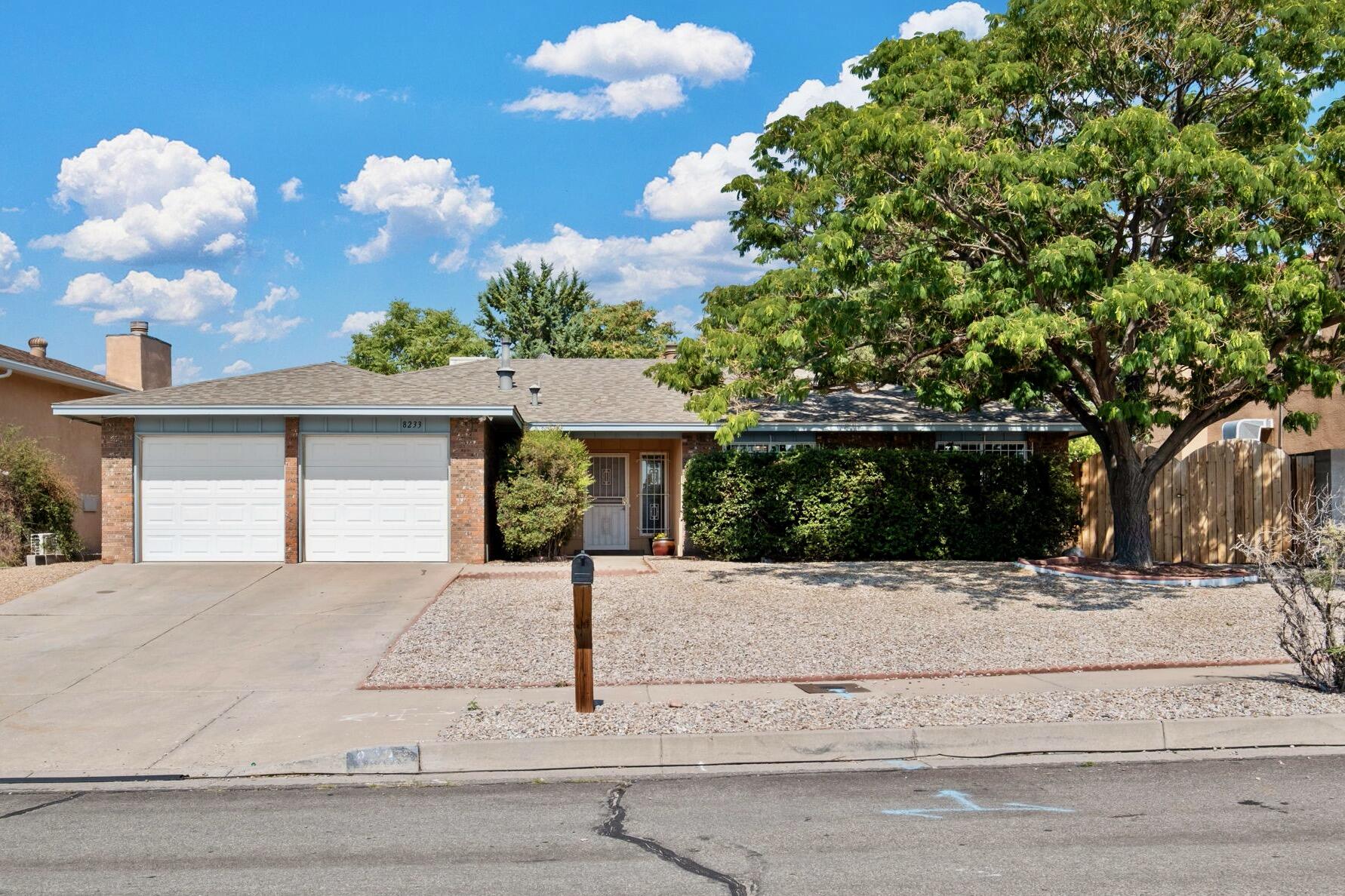 Two OPEN HOUSES this weekend: 3-5 PM on Saturday, August 16th and 2-4 PM on Sunday, August 17th! Beautifully updated Northeast Heights gem! This spacious home features 4 bedrooms, 2 living areas, fresh paint throughout, and new laminate wood flooring. The bathrooms have been tastefully upgraded with granite counters and tiled showers. Enjoy year-round outdoor living under the large covered patio complete with lighting and ceiling fans--perfect for entertaining or relaxing. Located within a few blocks of the Cherry Hills Library and Heritage Hills Park, you'll love the convenience of this desirable neighborhood.