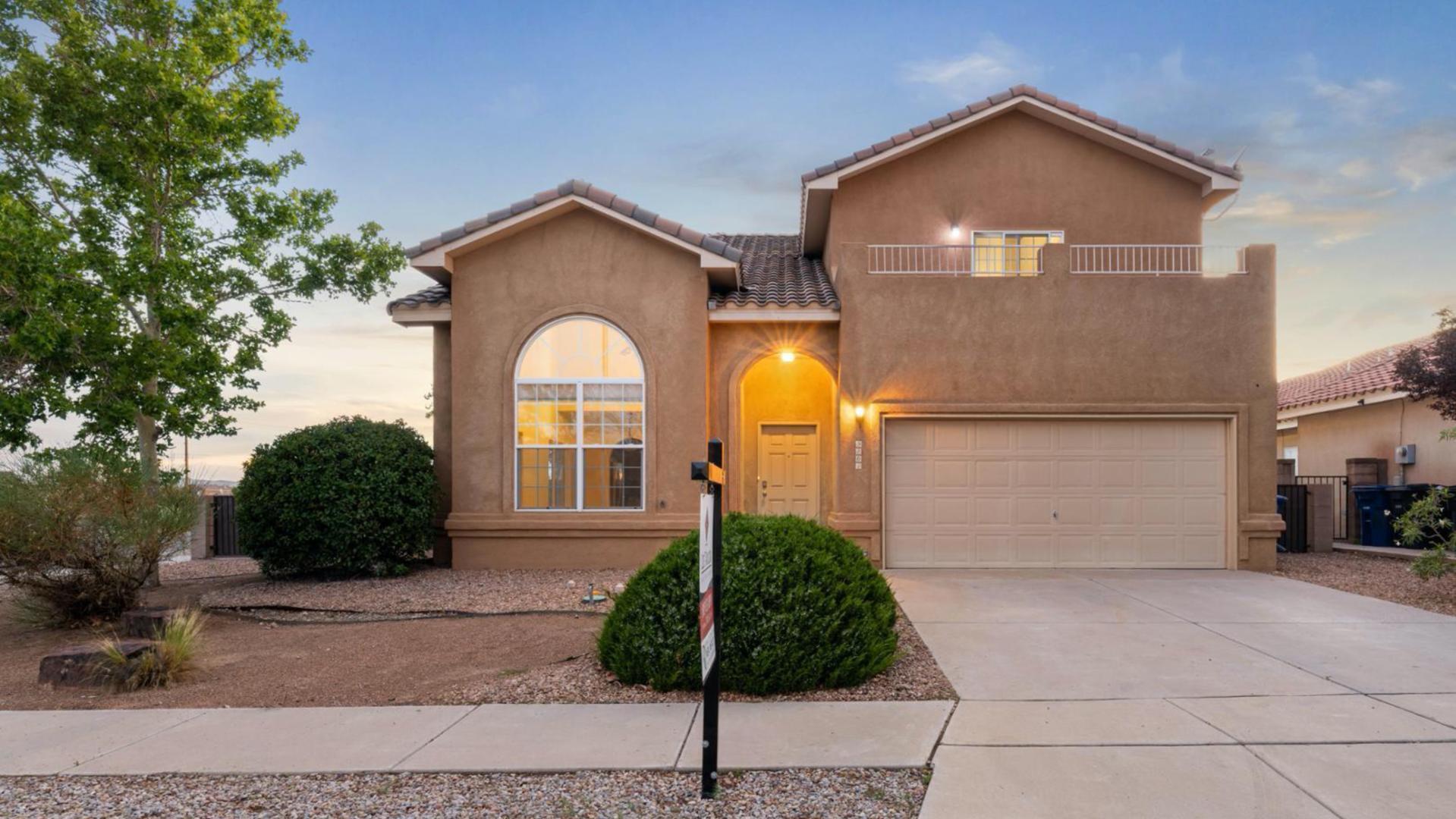 Stunning Corner-Lot Home with Incredible Views & Outdoor Amenities! Welcome to this beautifully designed 4-bedroom, 2.75-bathroom home, perfectly situated on a desirable corner lot with possible side yard access, and breathtaking views. Boasting a spacious & flowing floor plan, this home offers two generous living areas, ideal for both relaxation and entertaining. Upstairs, the primary bedroom serves as a private retreat, featuring a luxurious ensuite bathroom with double sinks, a jetted soaking tub, and a separate shower. Step out onto your private deck overlooking the west side, where you can enjoy stunning sunsets. One of the additional upstairs bedrooms also has its own deck, offering a beautiful view of the front yard and street. A versatile loft space completes the second floor