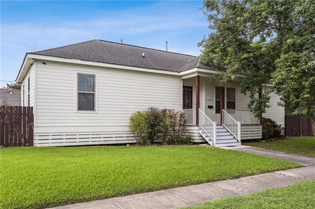 This beautifully maintained home offers a harmonious blend of comfort, style, and modern updates in a convenient location. Its inviting exterior, with a charming front porch and fresh curb appeal, sets the tone for the welcoming interiors.

Inside, you’re greeted by an open and airy layout enhanced by rich hardwood floors, crown molding, and abundant natural light. The dining area flows seamlessly into a spacious kitchen outfitted with granite countertops, stainless steel appliances, custom cabinetry, and a large center island with space for seating for everyday living or entertaining.

The comfortable living room features a tray ceiling and recessed lighting, creating a relaxed atmosphere perfect for gathering. The primary suite serves as a serene retreat with a generous layout, spa-like bath featuring a soaking tub, frameless glass shower, and dual vanities, plus a large walk-in closet for optimal storage.

Two additional bedrooms and a full guest bath offer versatility for family, guests, or a home office. The fully fenced backyard includes both green space and a private patio area shaded by mature trees, perfect for outdoor enjoyment.

With thoughtful finishes and a move-in-ready condition, this property offers both style and convenience in one inviting package.