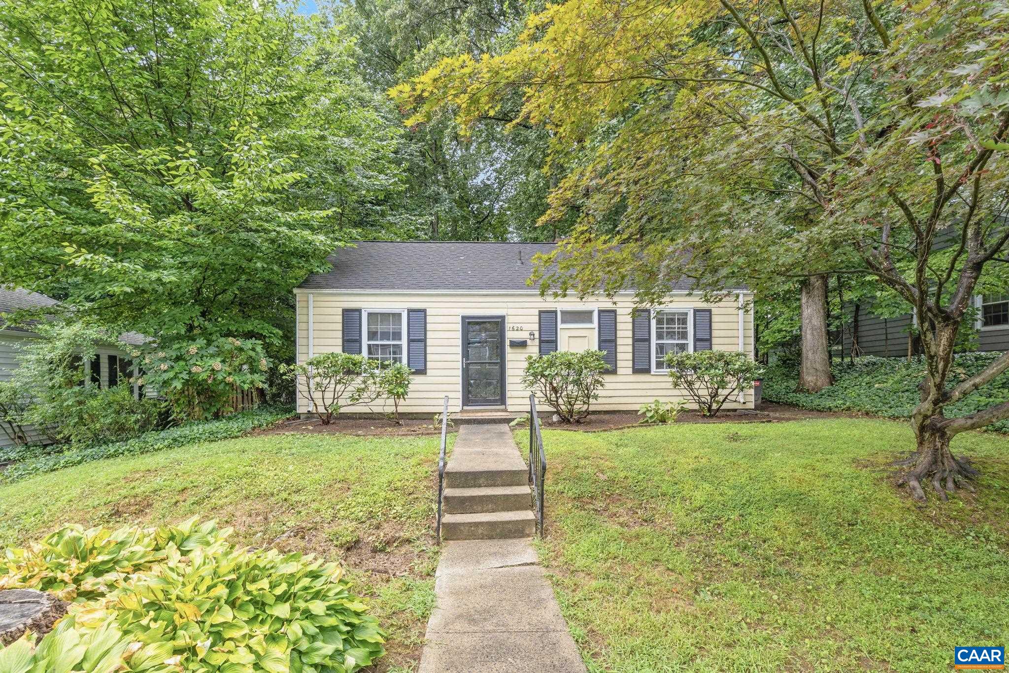Don’t miss this rare opportunity to own one of the largest and most stunning lots in the coveted Rugby neighborhood, priced well UNDER assessment! This charming cottage, surrounded by beautiful trees and featuring a delightful slate patio, offers a strong rental history and versatile living options with three bedrooms (or two plus an office or dining room) and a full bath. Recent upgrades include paint, a new refrigerator, kitchen faucet, wall A/C unit, ceiling fan, bathroom flooring and sink. Nestled among multi-million dollar homes, this property is ideal for those looking to create their dream residence or seize a prime investment opportunity. Located on a tranquil street just off Rugby Rd, you’ll enjoy super convenient access to all that Charlottesville has to offer, including UVA, downtown restaurants, the mall, the hospital, Whole Foods, Barracks Road, and Route 29. This is truly an unbeatable location—an exceptional chance to invest in the least expensive home in a most prestigious neighborhood!